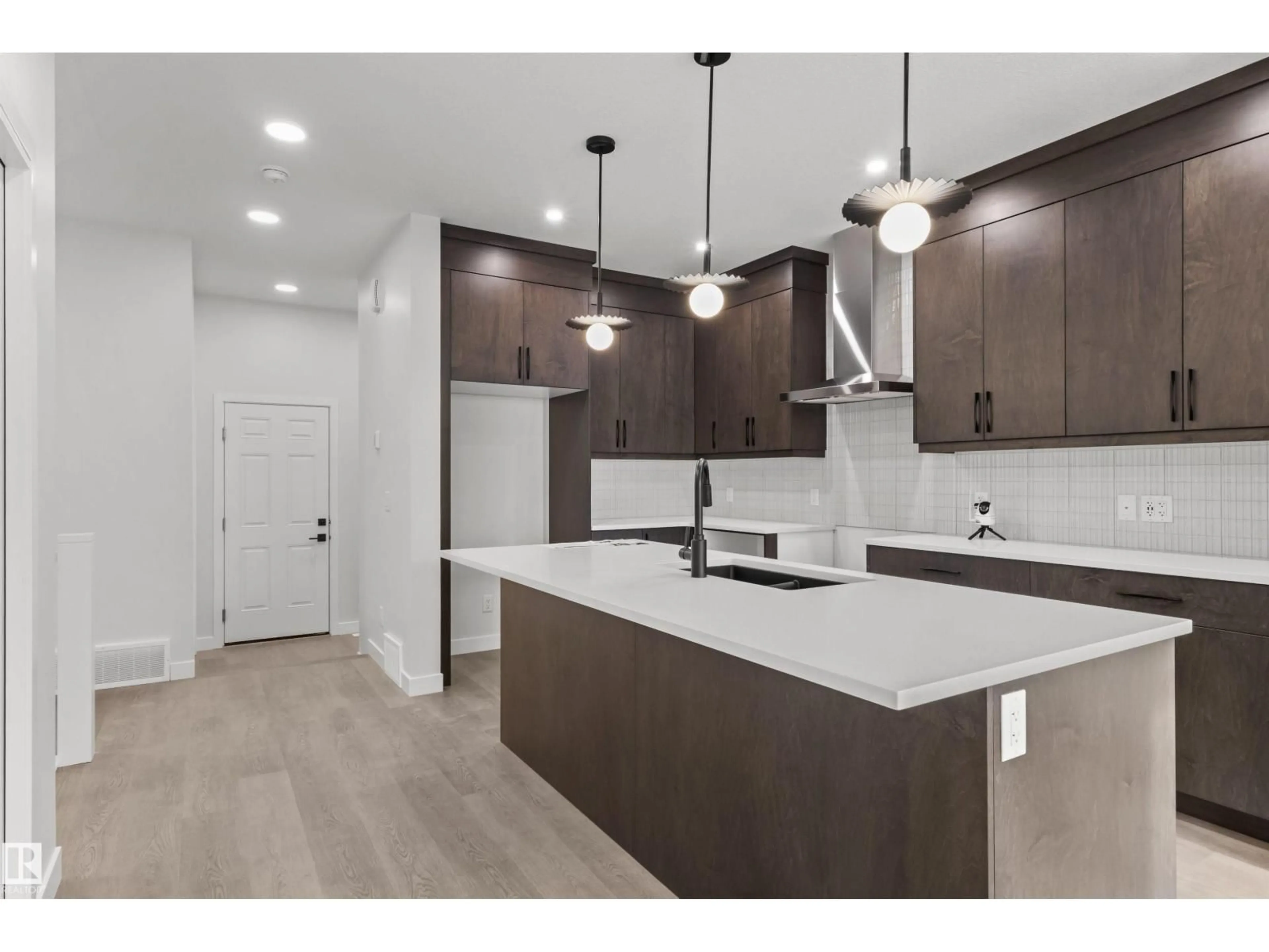Open concept kitchen, unknown for 9096 ELVES LO NW, Edmonton Alberta T6M3G4