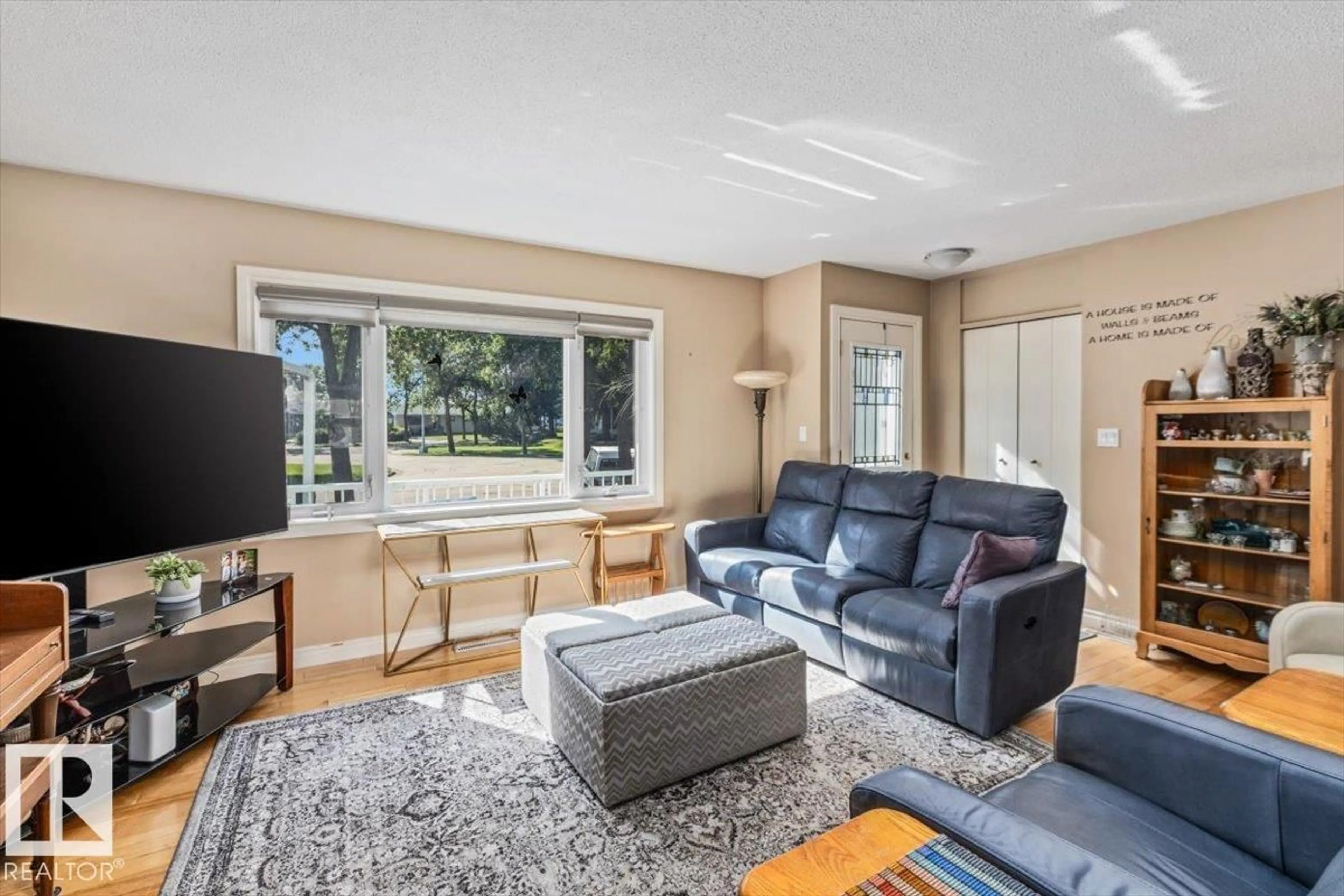 Living room with furniture, unknown for 8928 92 AV, Fort Saskatchewan Alberta T8L1A5