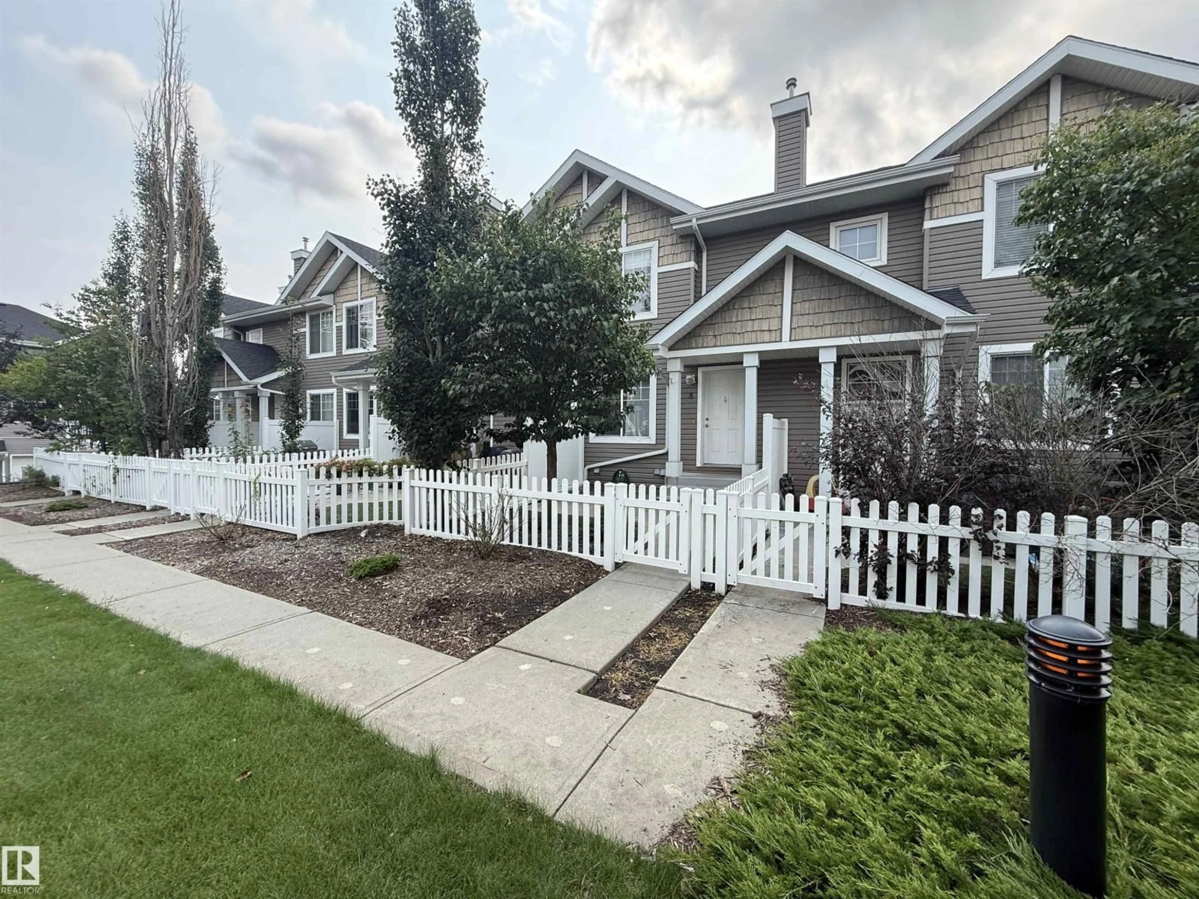 A pic from outside/outdoor area/front of a property/back of a property/a pic from drone, street for #8 - 3075 TRELLE CR, Edmonton Alberta T6R3V5