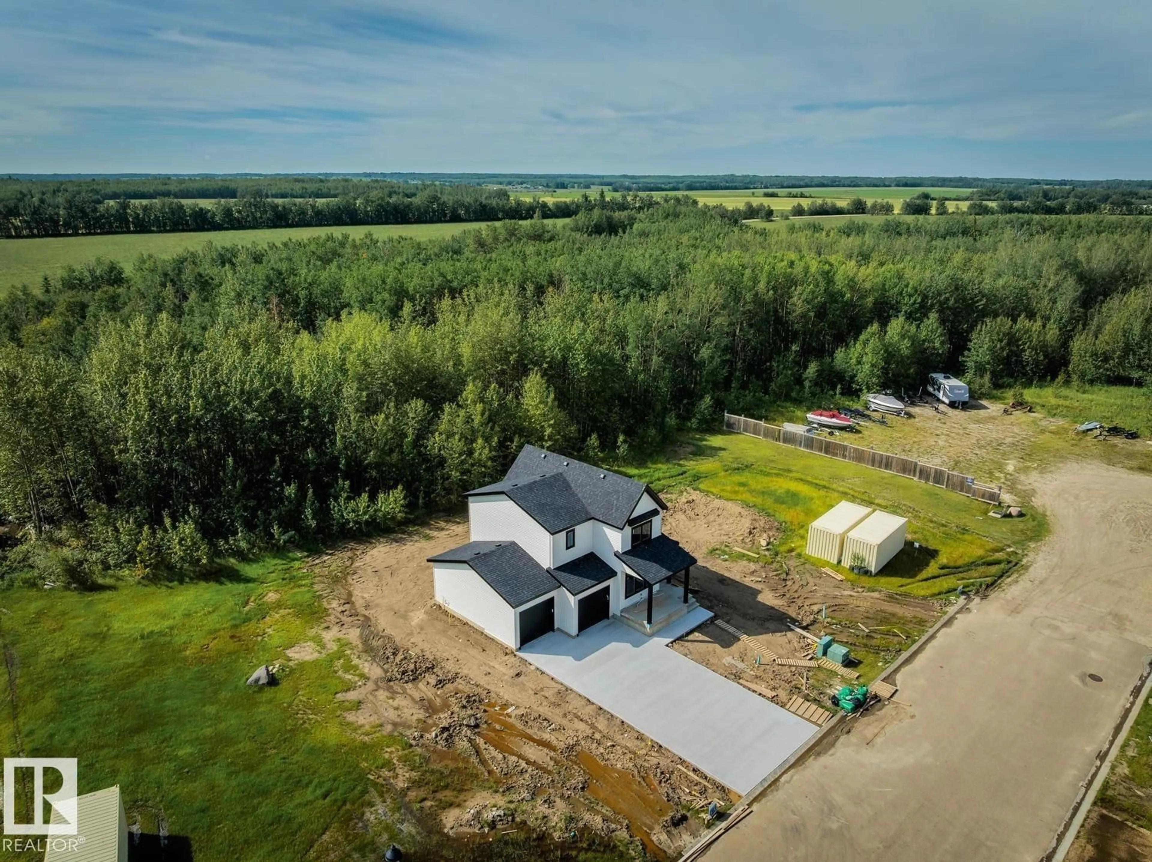 A pic from outside/outdoor area/front of a property/back of a property/a pic from drone, unknown for 207 - 3410 STE ANNE TR, Rural Lac Ste. Anne County Alberta T0E0A1