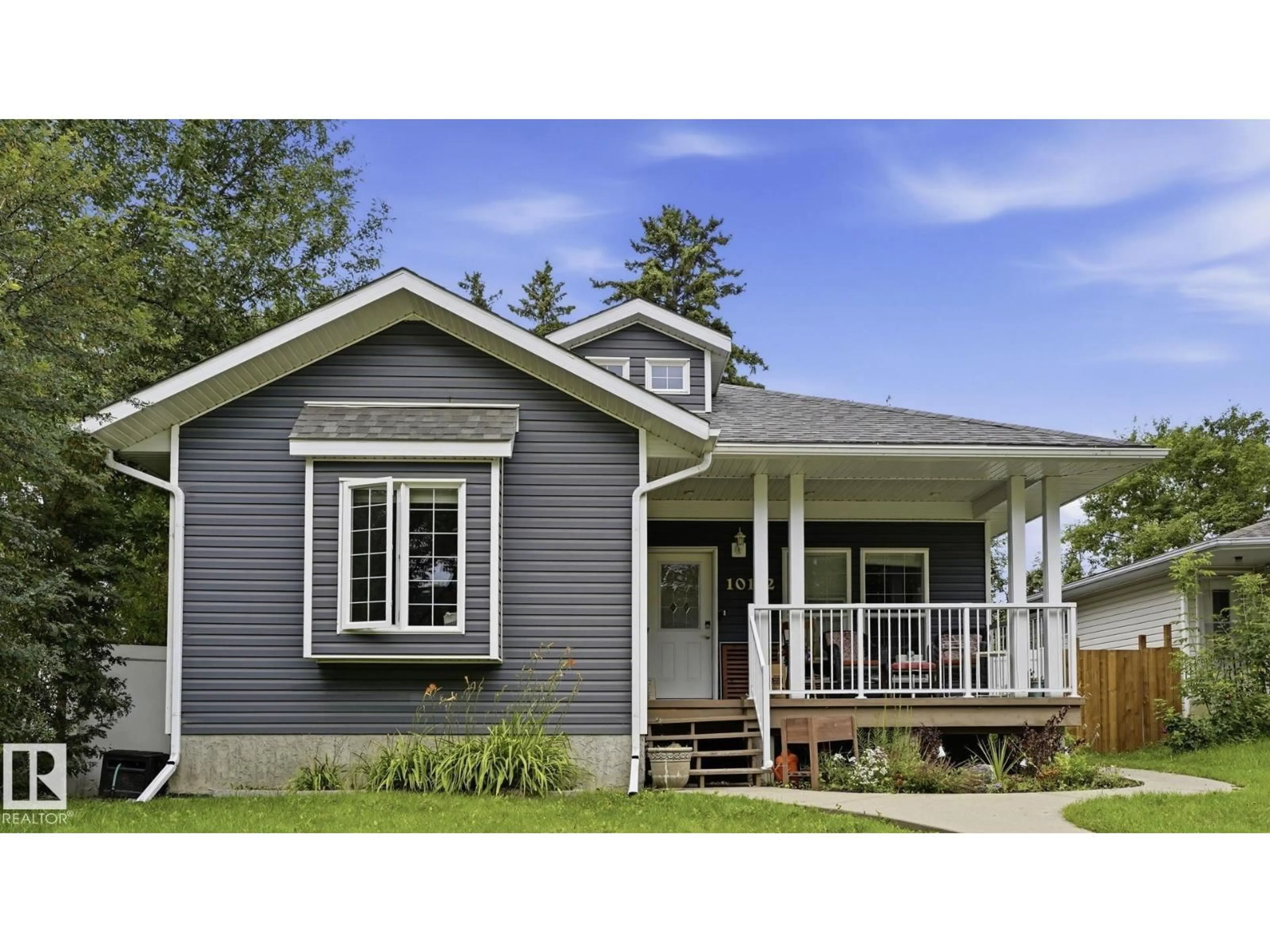Home with vinyl exterior material, street for 10112 105 ST, Westlock Alberta T7P1V7