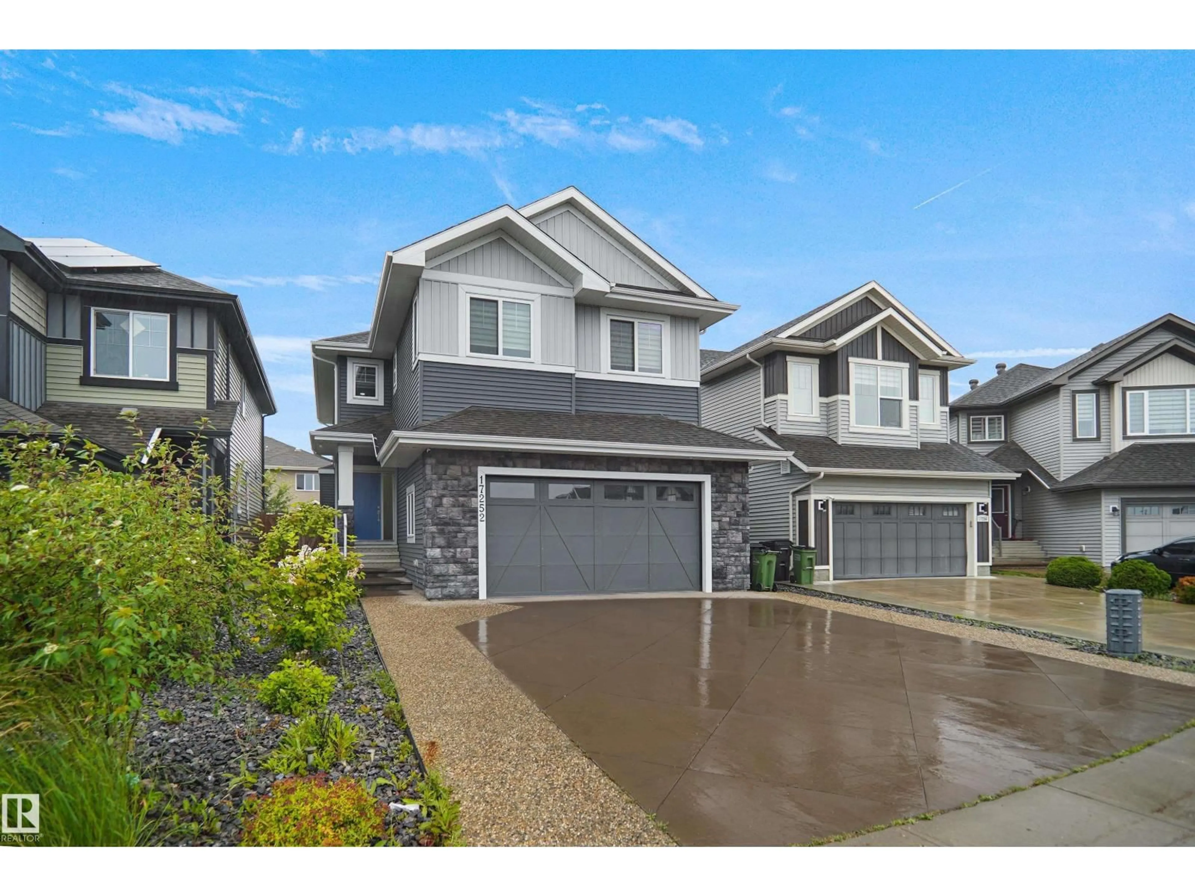 Home with vinyl exterior material, street for 17252 71 ST, Edmonton Alberta T5Z0M9