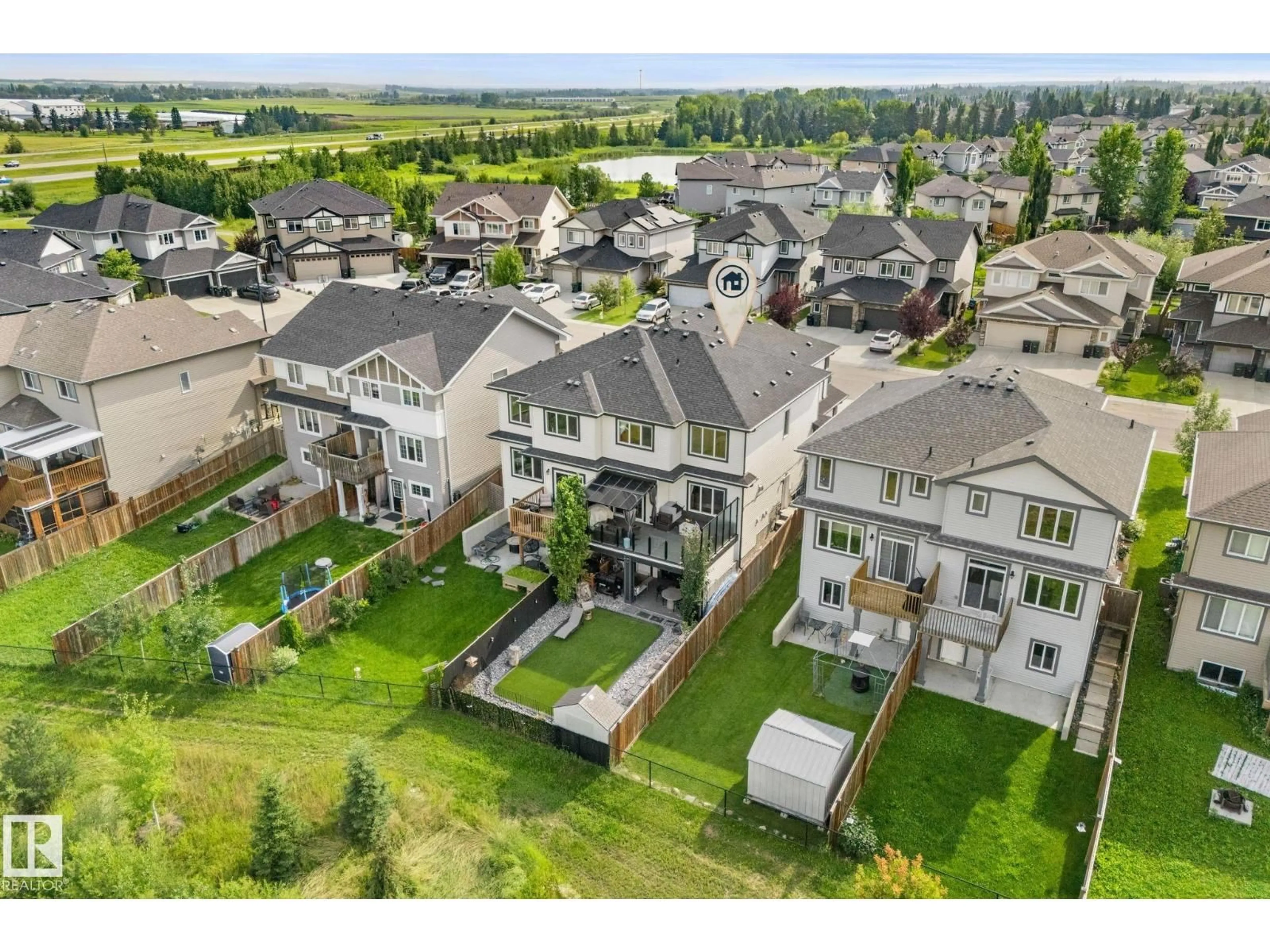 A pic from outside/outdoor area/front of a property/back of a property/a pic from drone, mountain view for 52 AVERY CV, Spruce Grove Alberta T7X0X8