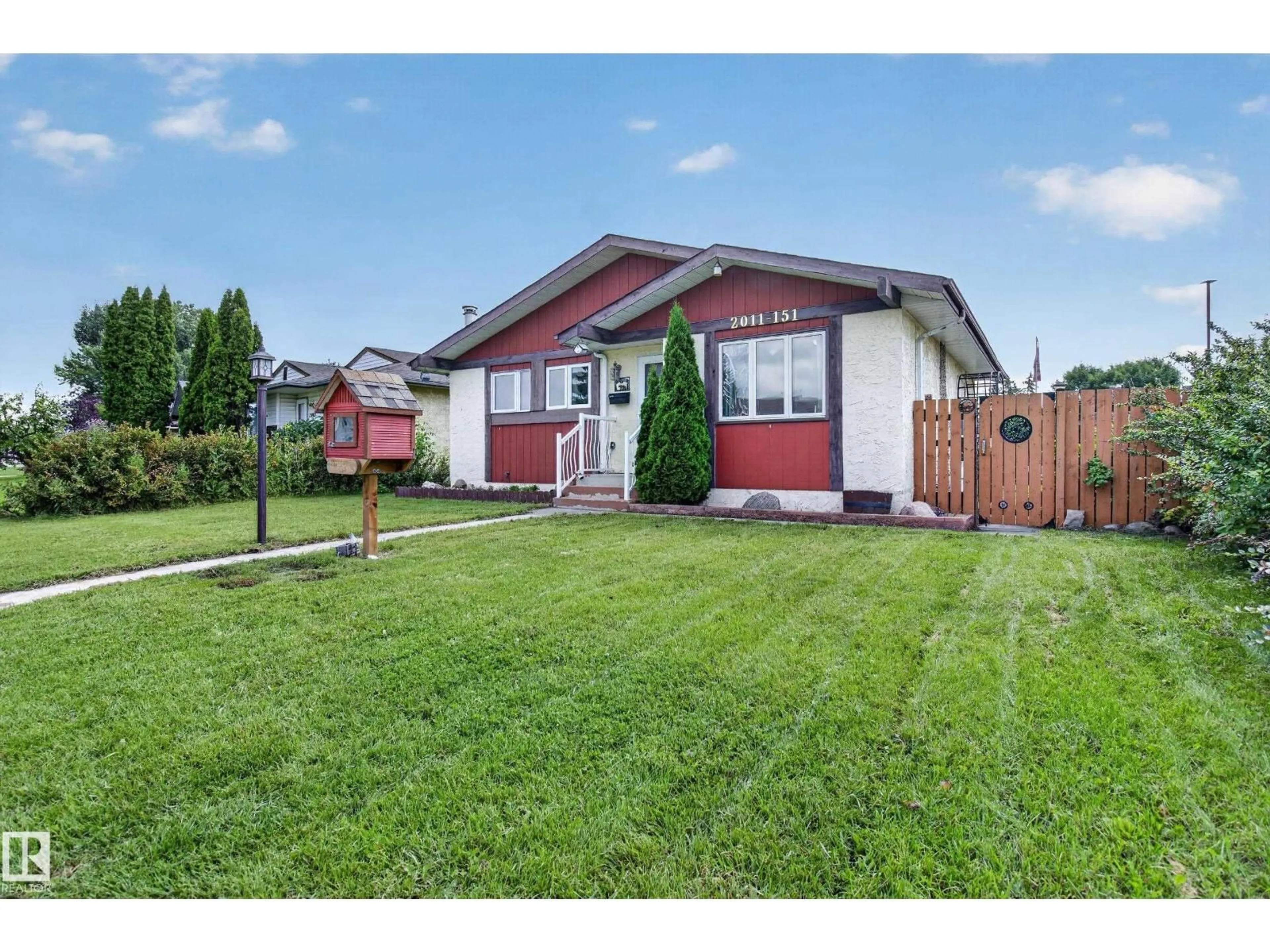 Home with vinyl exterior material, street for 2011 151 AV, Edmonton Alberta T5Y1W1
