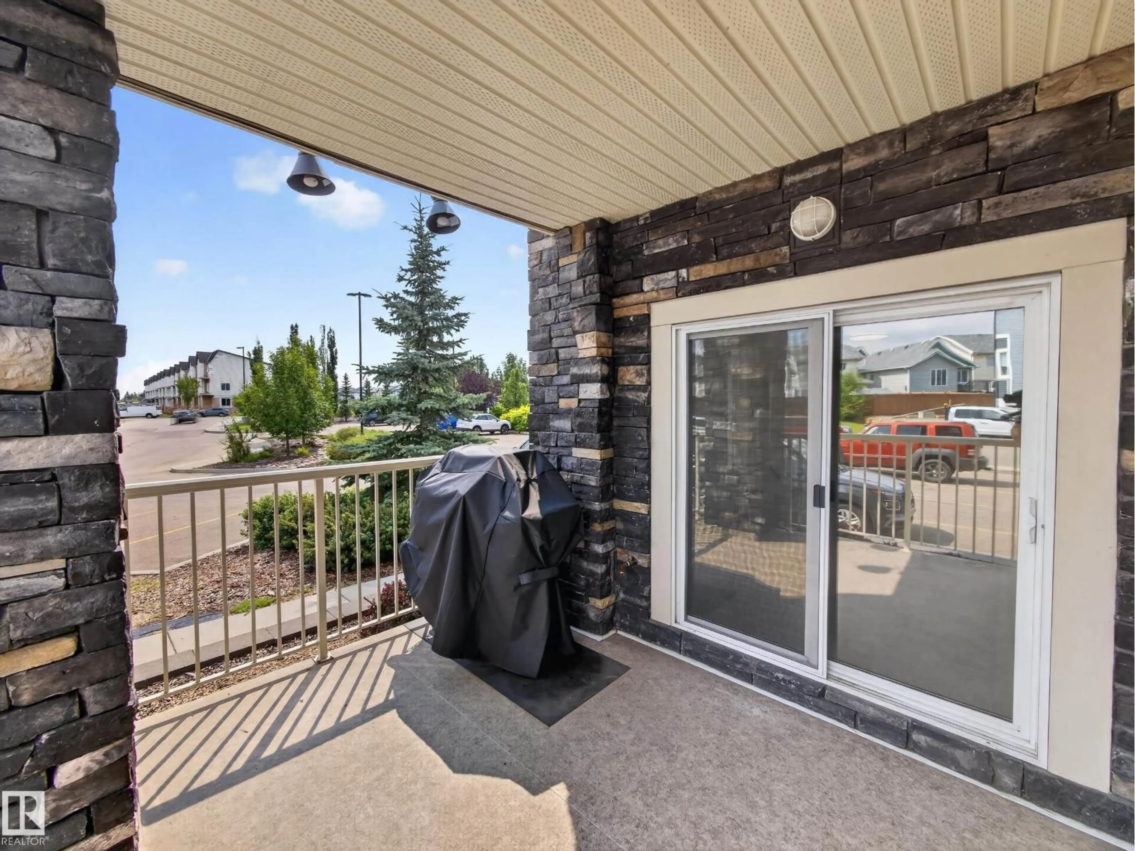 Patio, mountain view for 121 - 3670 139 AV NW, Edmonton Alberta T6Y3N5