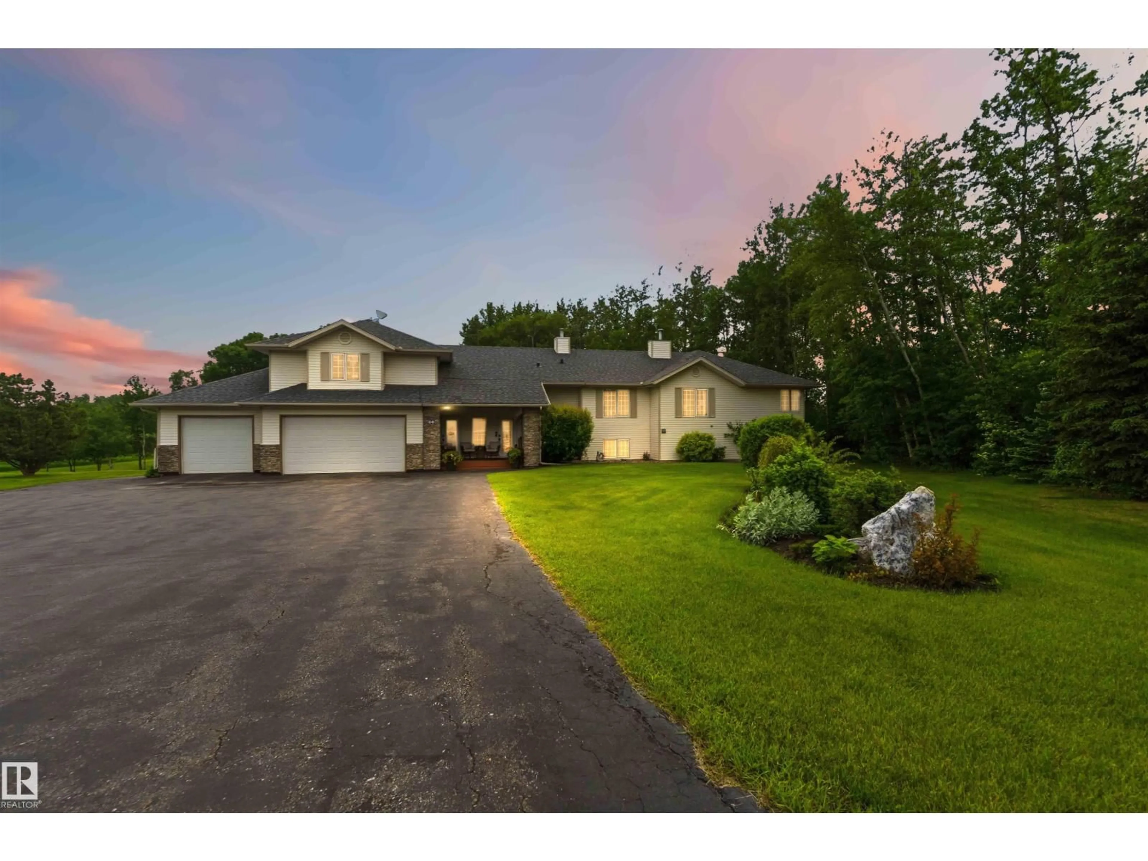 A pic from outside/outdoor area/front of a property/back of a property/a pic from drone, street for 60 56019 RGE RD 230, Rural Sturgeon County Alberta T0A1N2