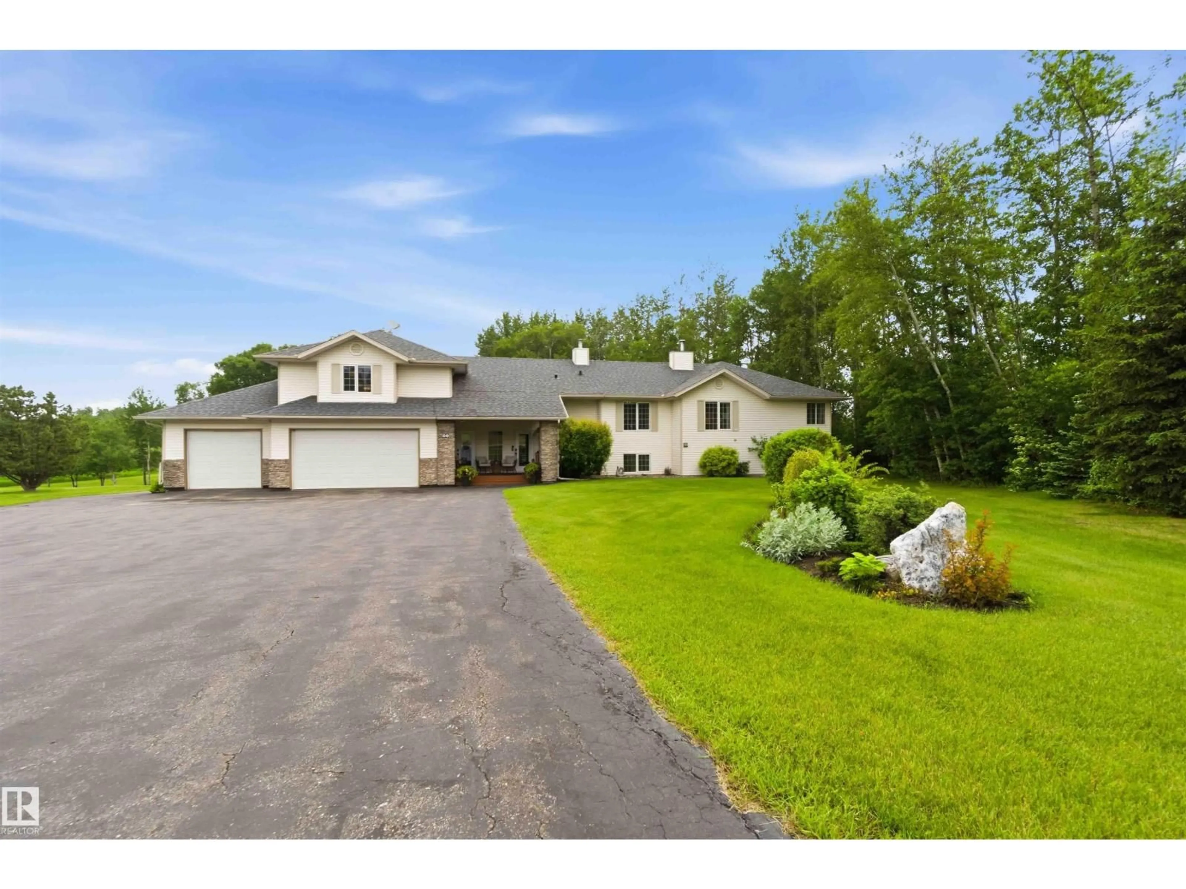 A pic from outside/outdoor area/front of a property/back of a property/a pic from drone, street for 60 56019 RGE RD 230, Rural Sturgeon County Alberta T0A1N2