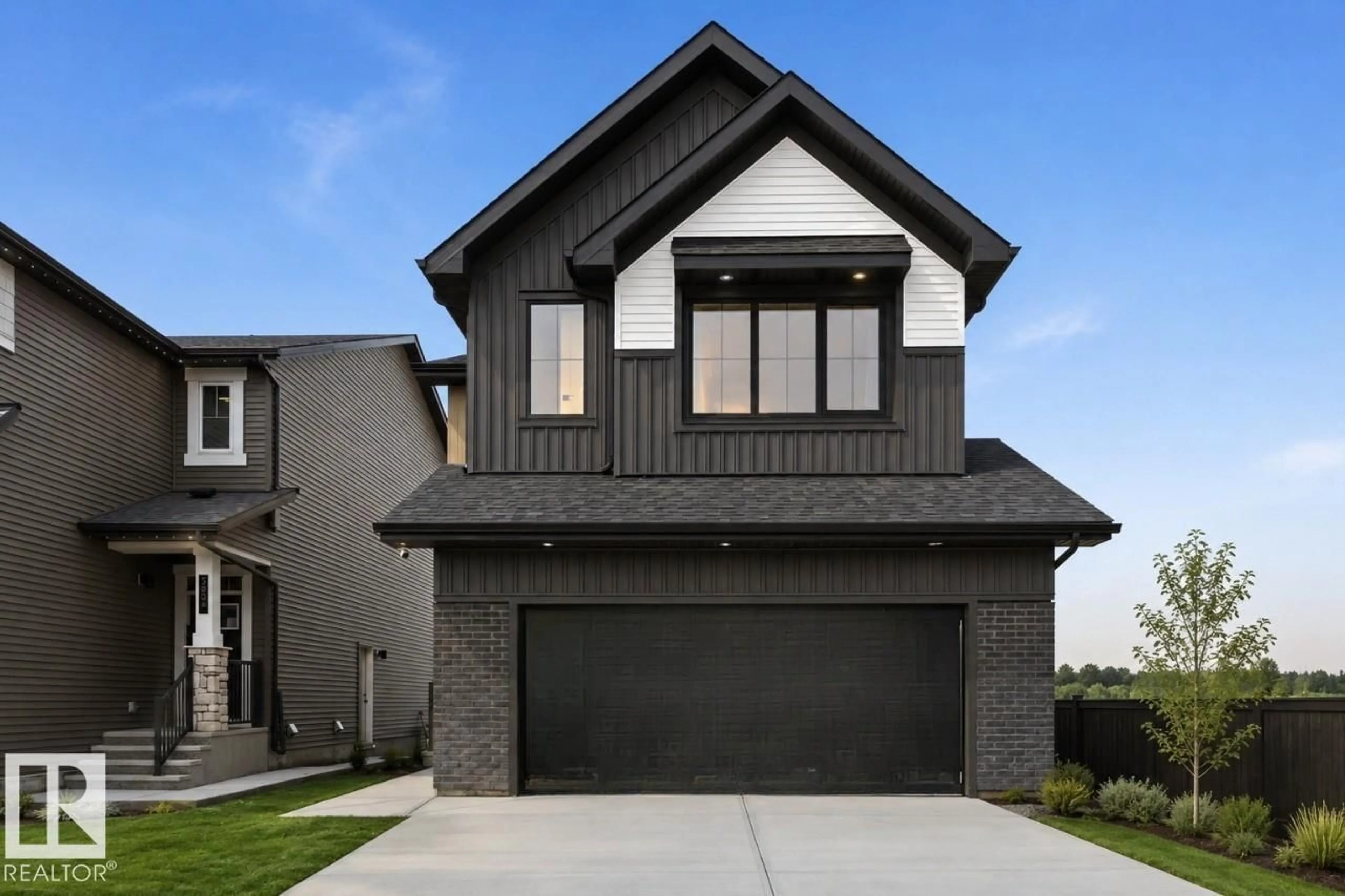 Home with vinyl exterior material, street for 7105 50A AVE, Beaumont Alberta T4X2Z3