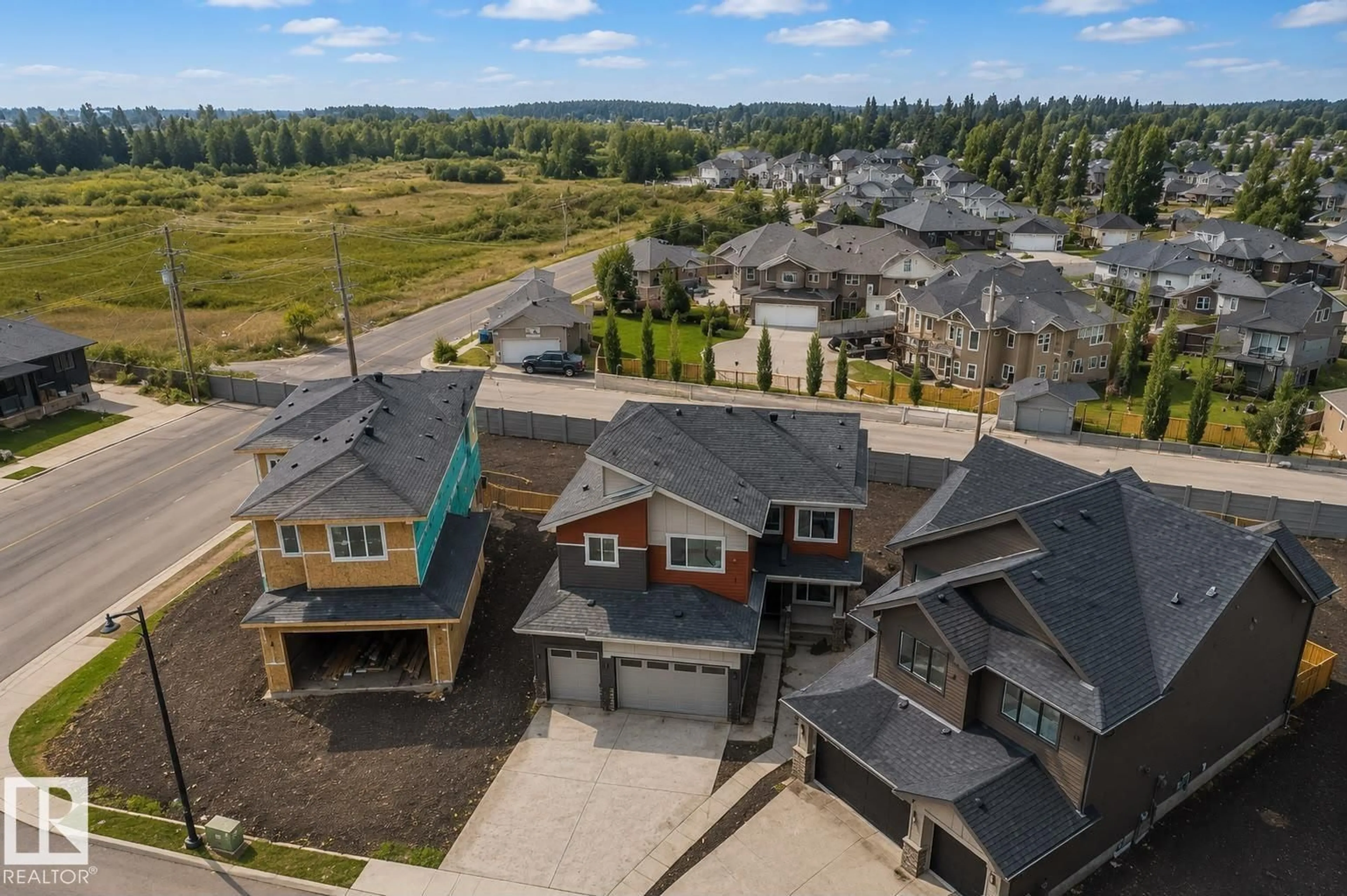 A pic from outside/outdoor area/front of a property/back of a property/a pic from drone, mountain view for 159 GRAYBRIAR DR, Stony Plain Alberta T7Z0M7