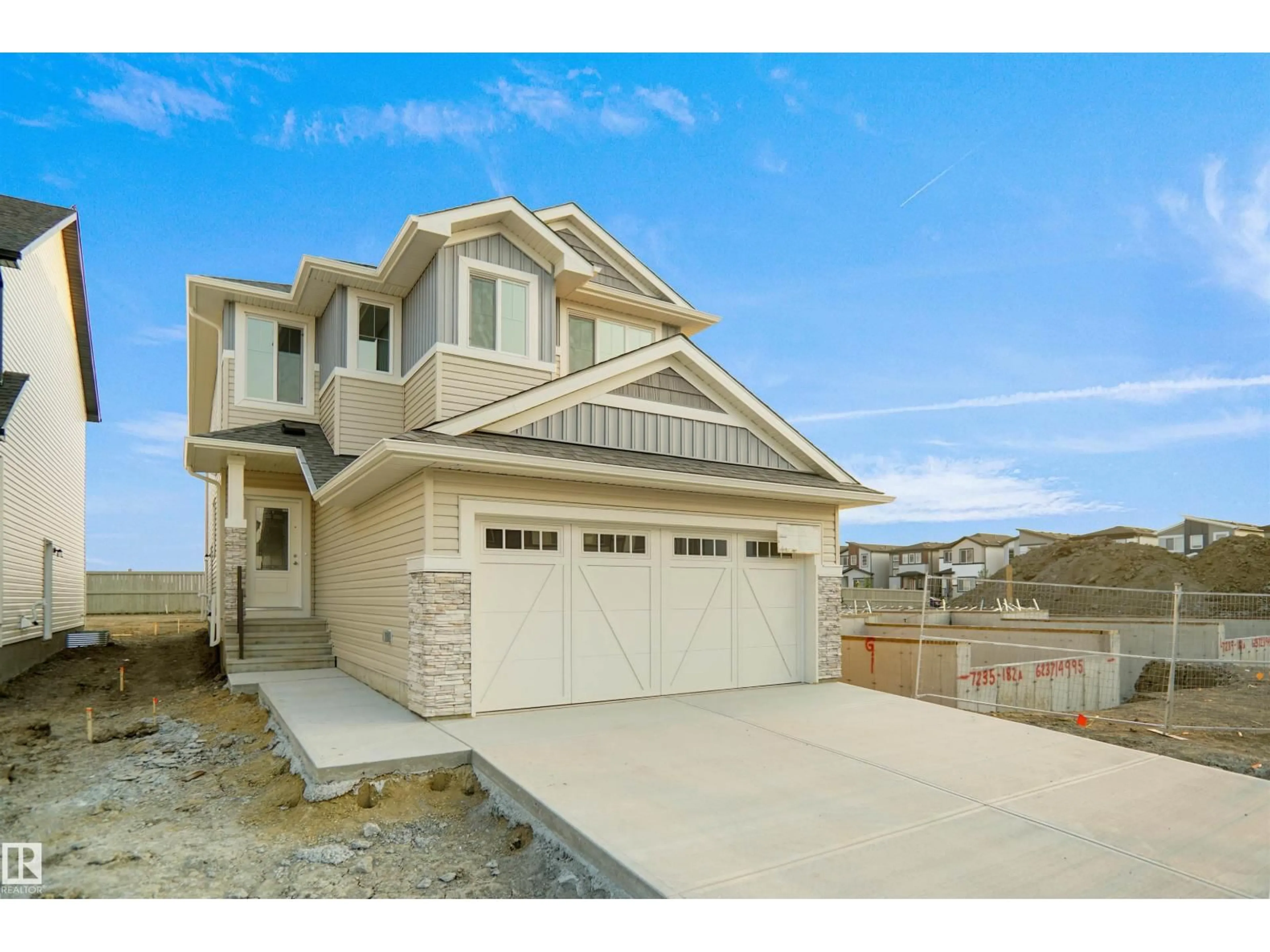 Home with vinyl exterior material, street for 22948 82 AV, Edmonton Alberta T5T4H5