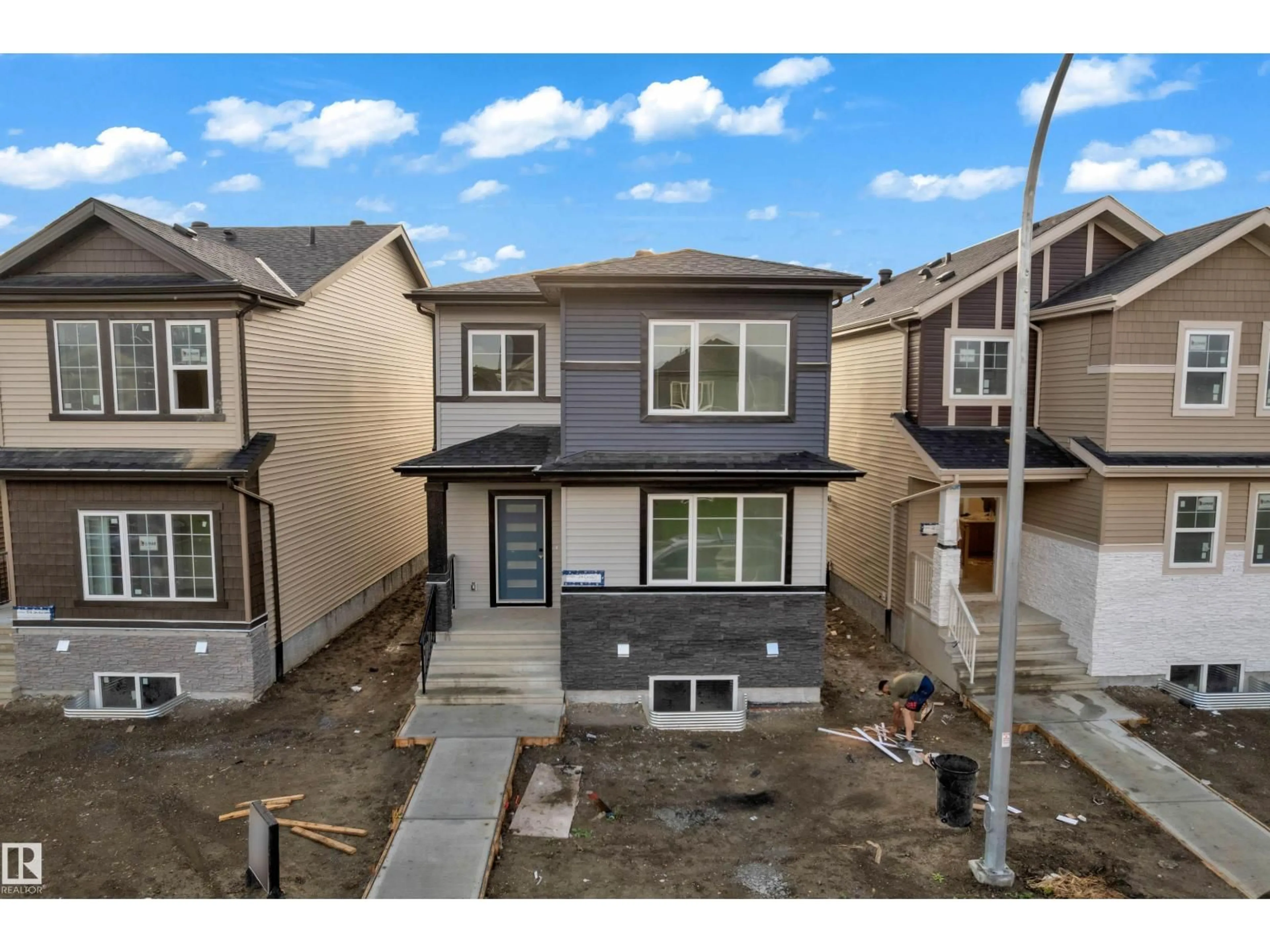 A pic from outside/outdoor area/front of a property/back of a property/a pic from drone, street for 70 COVELL CM, Spruce Grove Alberta T7X0Y7
