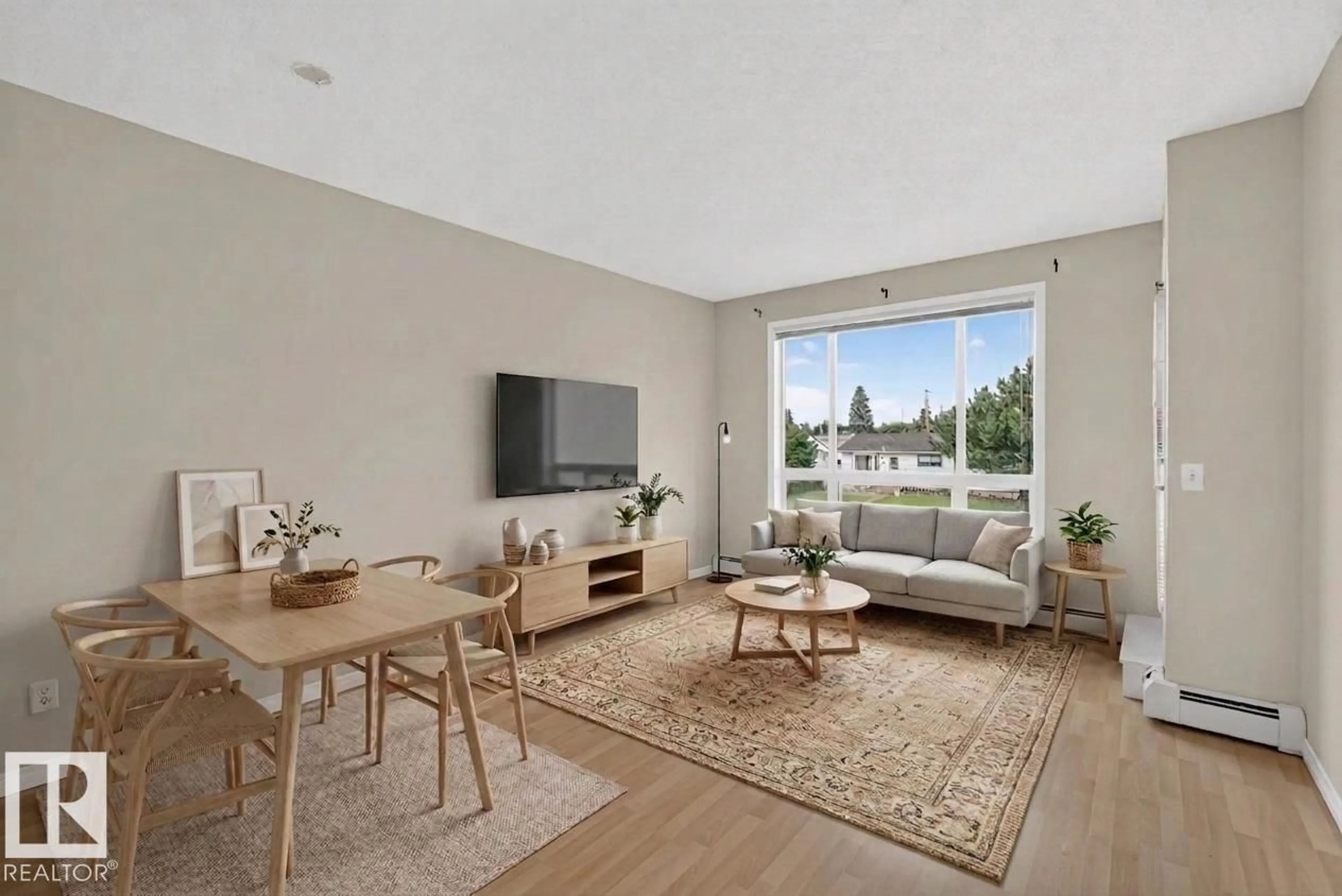 Living room with furniture, unknown for 205 - 6315 135 AV, Edmonton Alberta T5A5J7