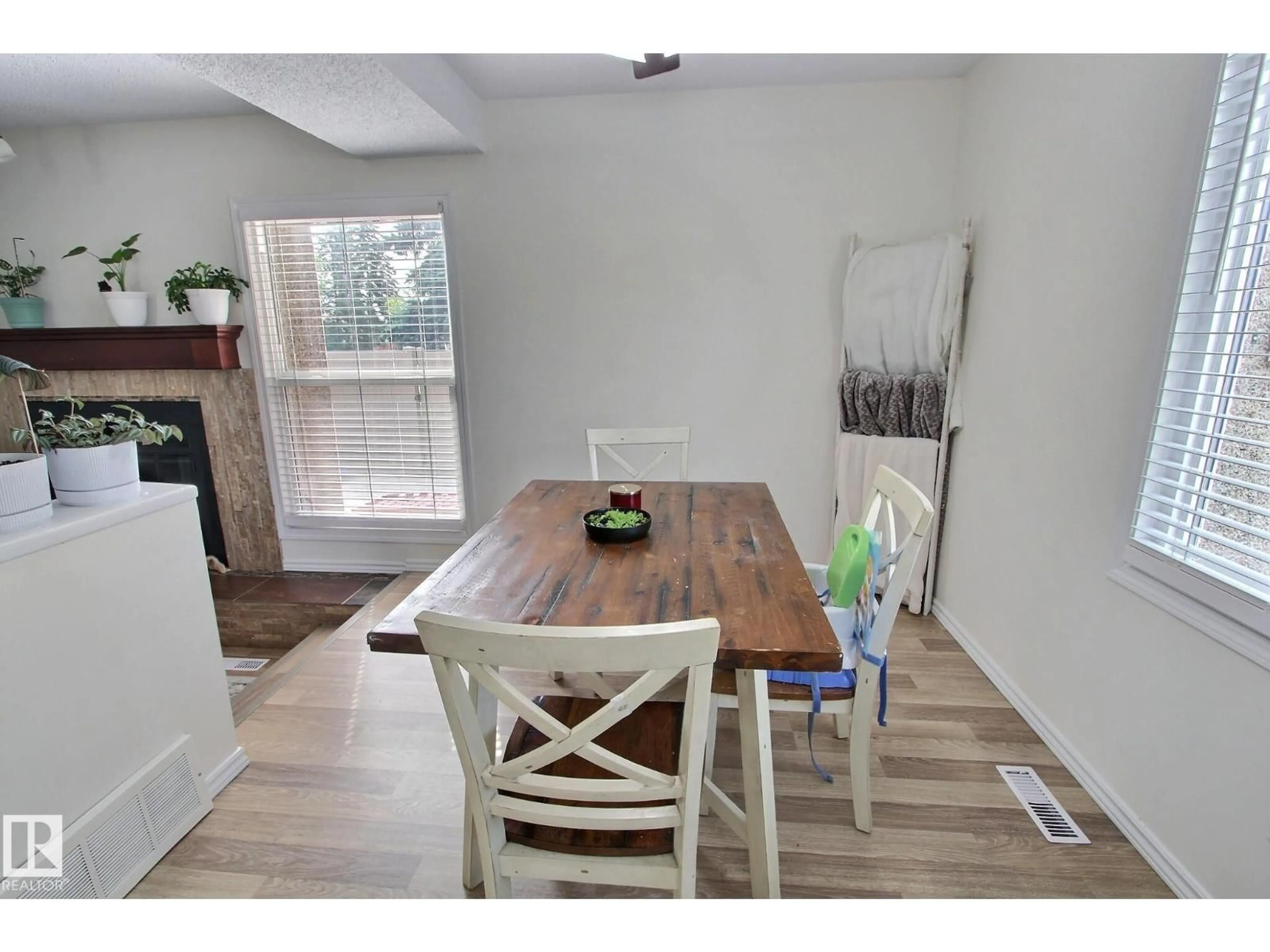 Dining room, wood/laminate floor for NW - 17004 100 ST, Edmonton Alberta T5X5E1