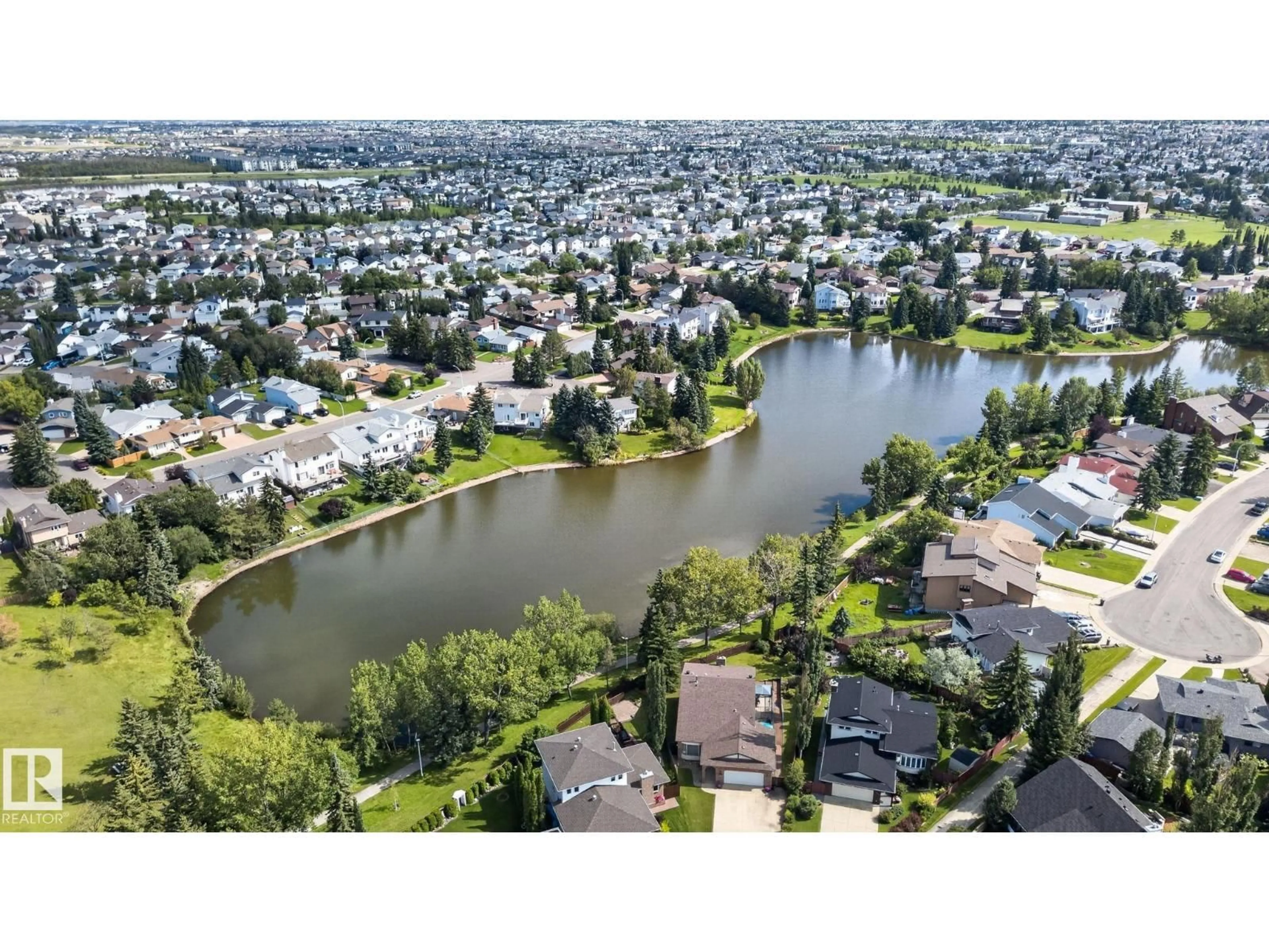 A pic from outside/outdoor area/front of a property/back of a property/a pic from drone, water/lake/river/ocean view for NW - 17775 95 ST, Edmonton Alberta T5Z2E3