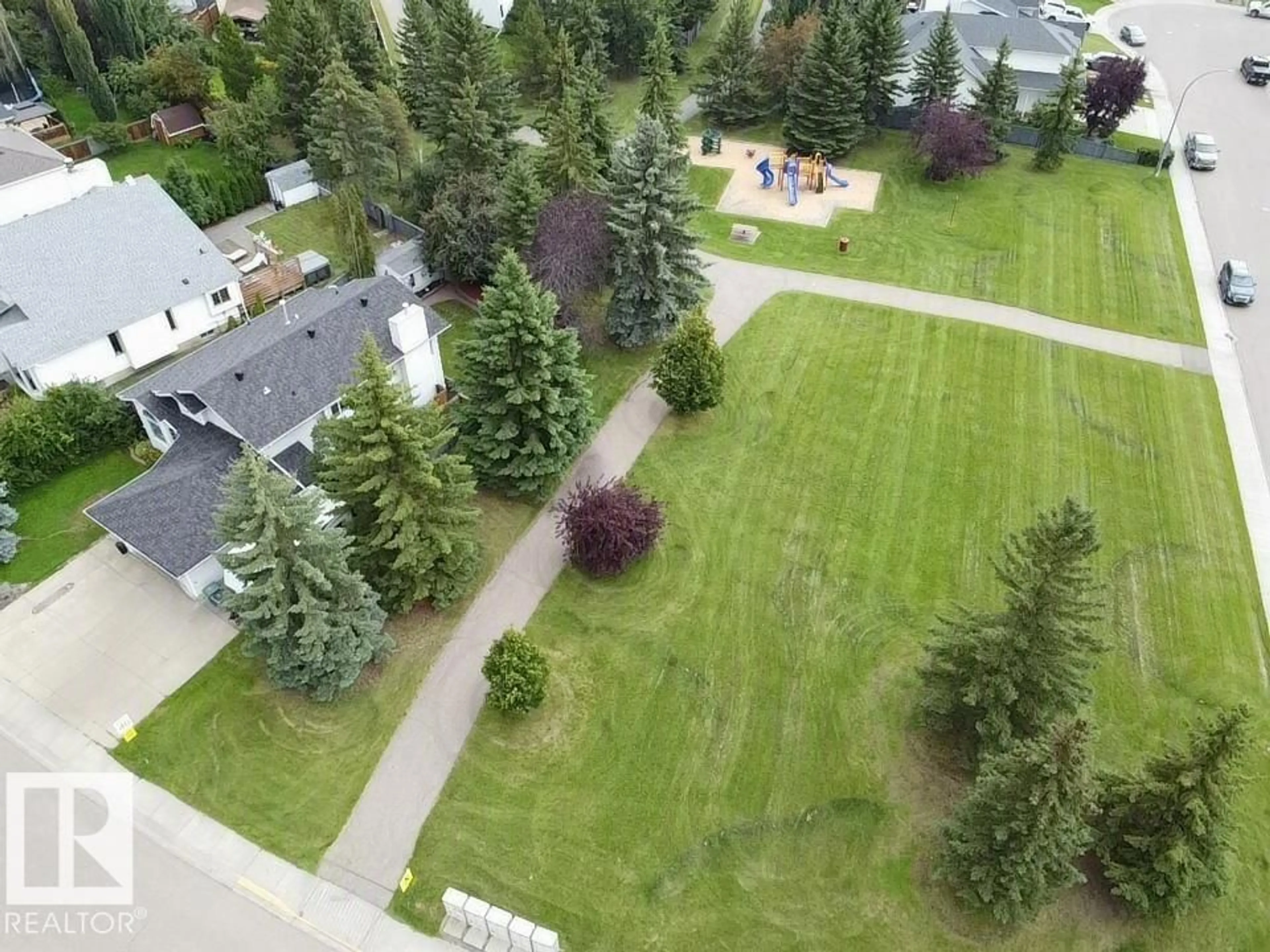 A pic from outside/outdoor area/front of a property/back of a property/a pic from drone, unknown for 4705 43 ST, Beaumont Alberta T4X1H2