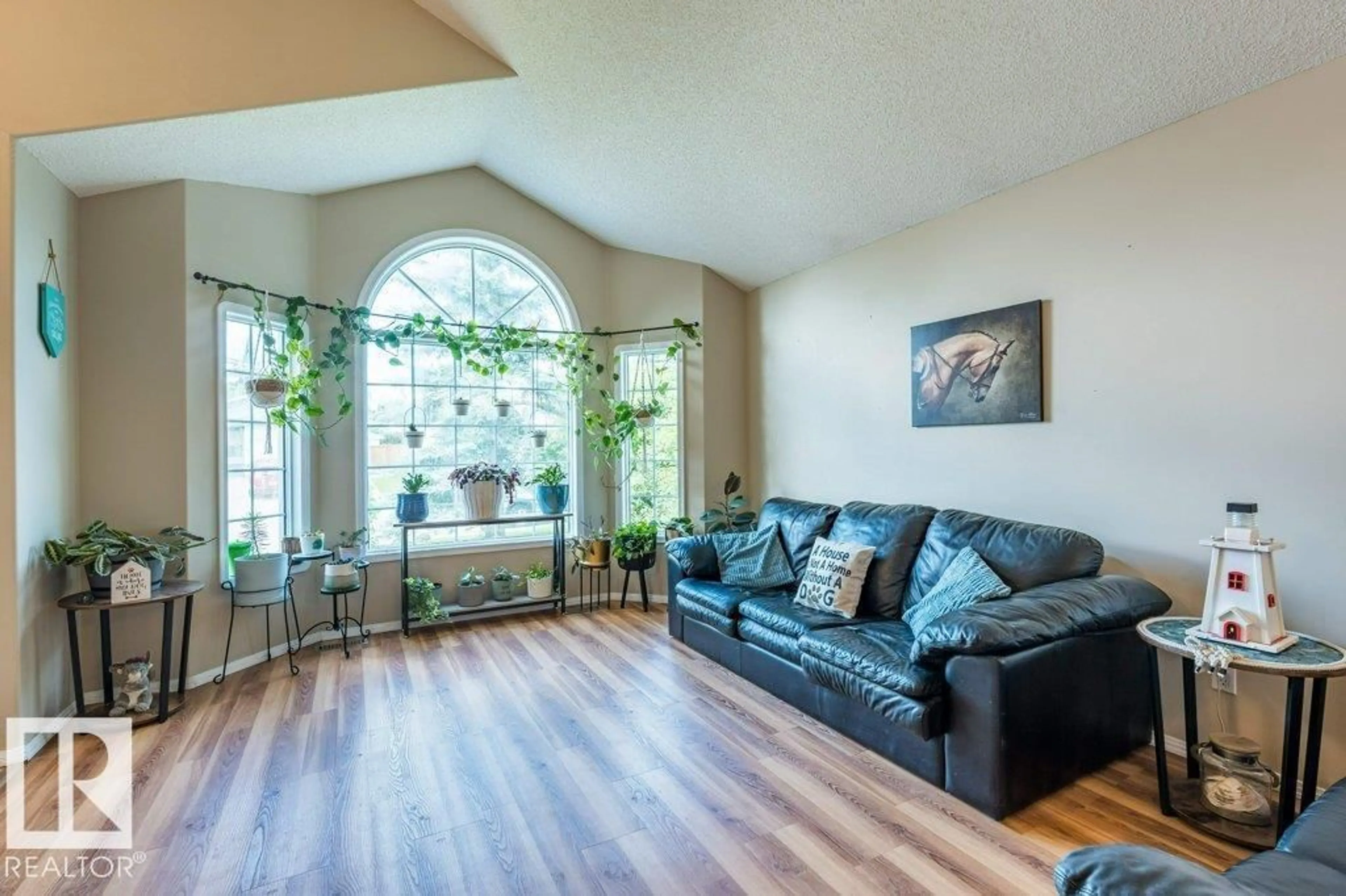Living room with furniture, unknown for 4705 43 ST, Beaumont Alberta T4X1H2