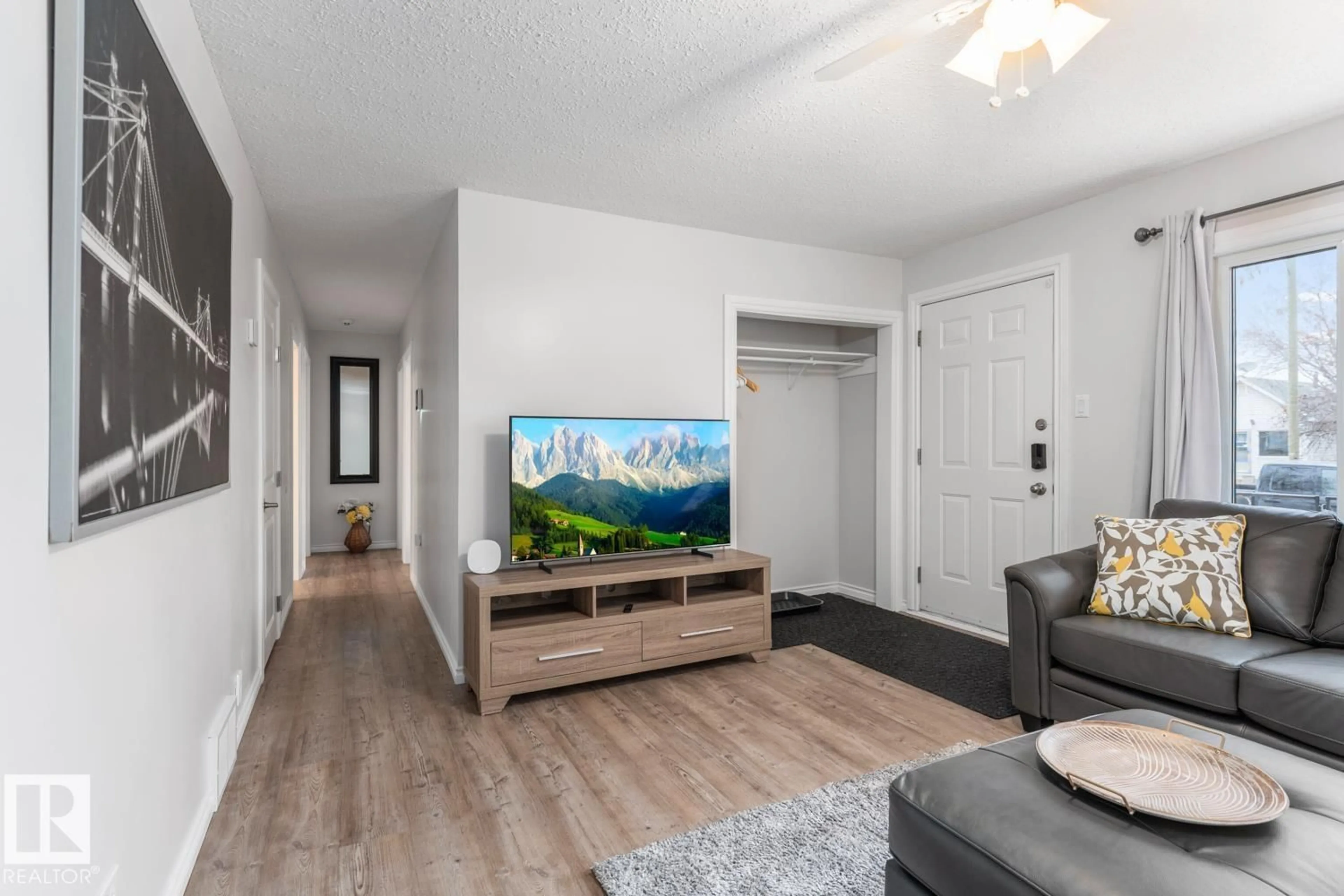Living room with furniture, unknown for 5210 51 AV, Bonnyville Town Alberta T9N2A8
