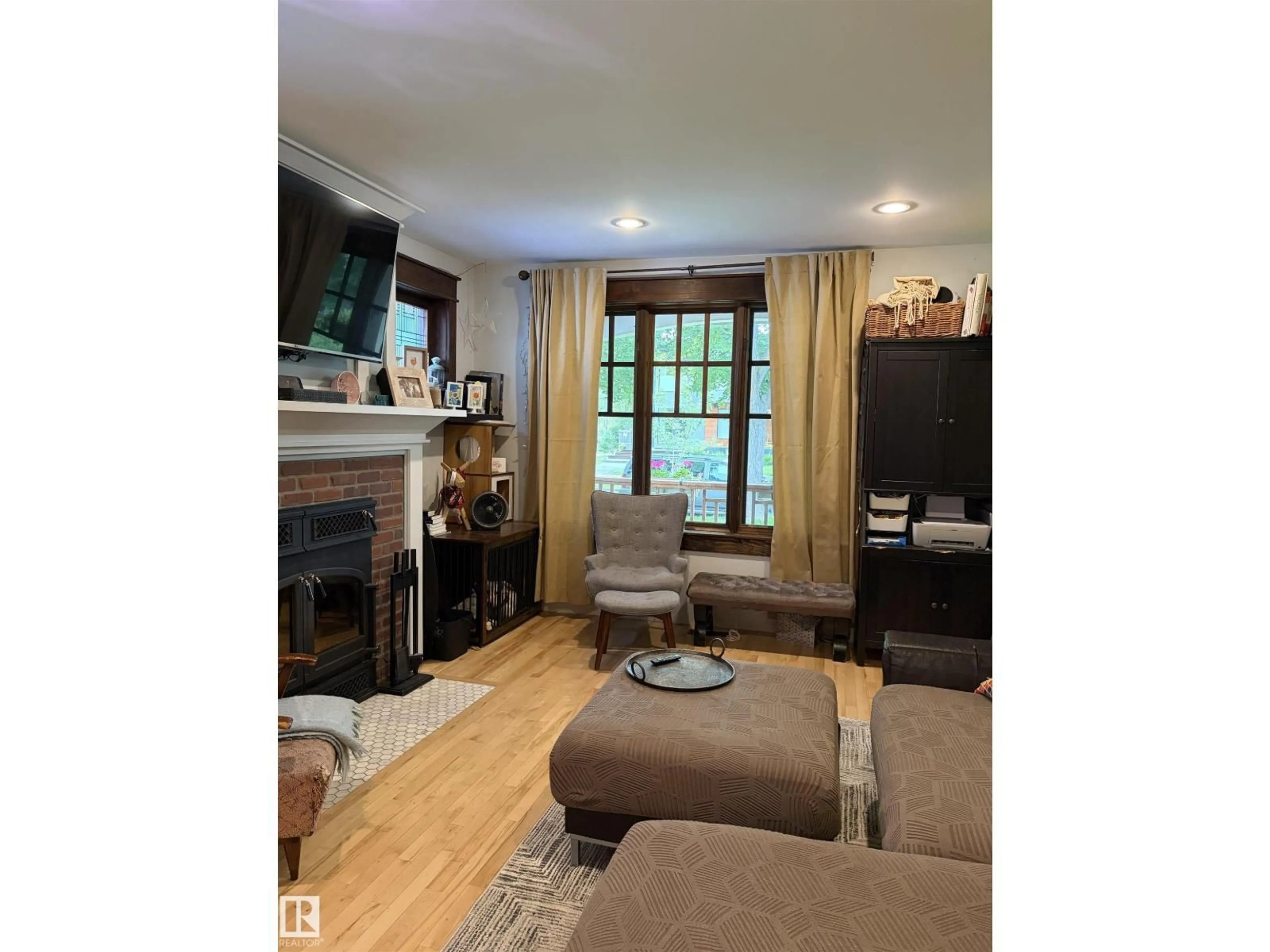 Living room with furniture, unknown for 10994 126 ST, Edmonton Alberta T5M0P5