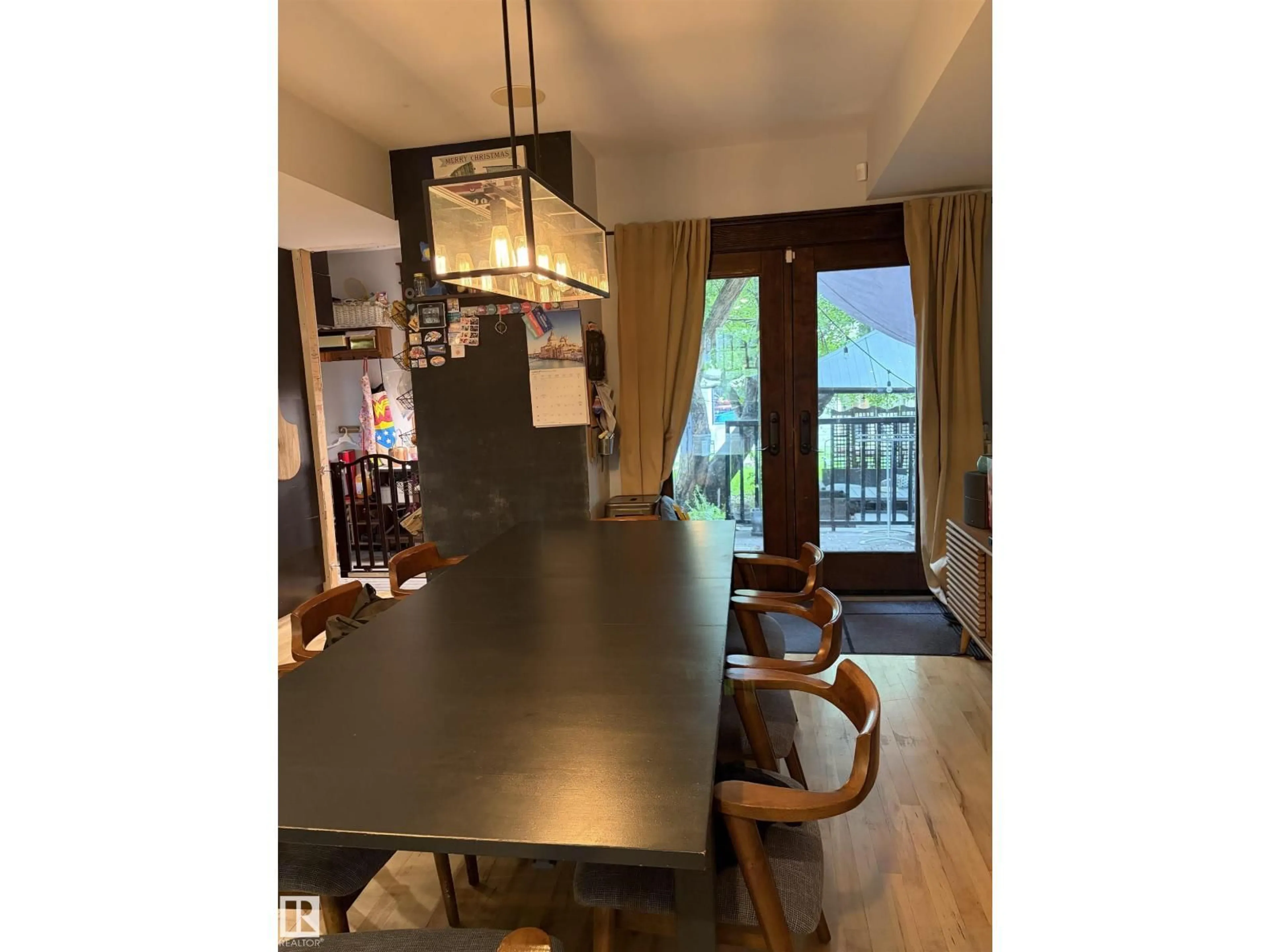 Dining room, wood/laminate floor for 10994 126 ST, Edmonton Alberta T5M0P5