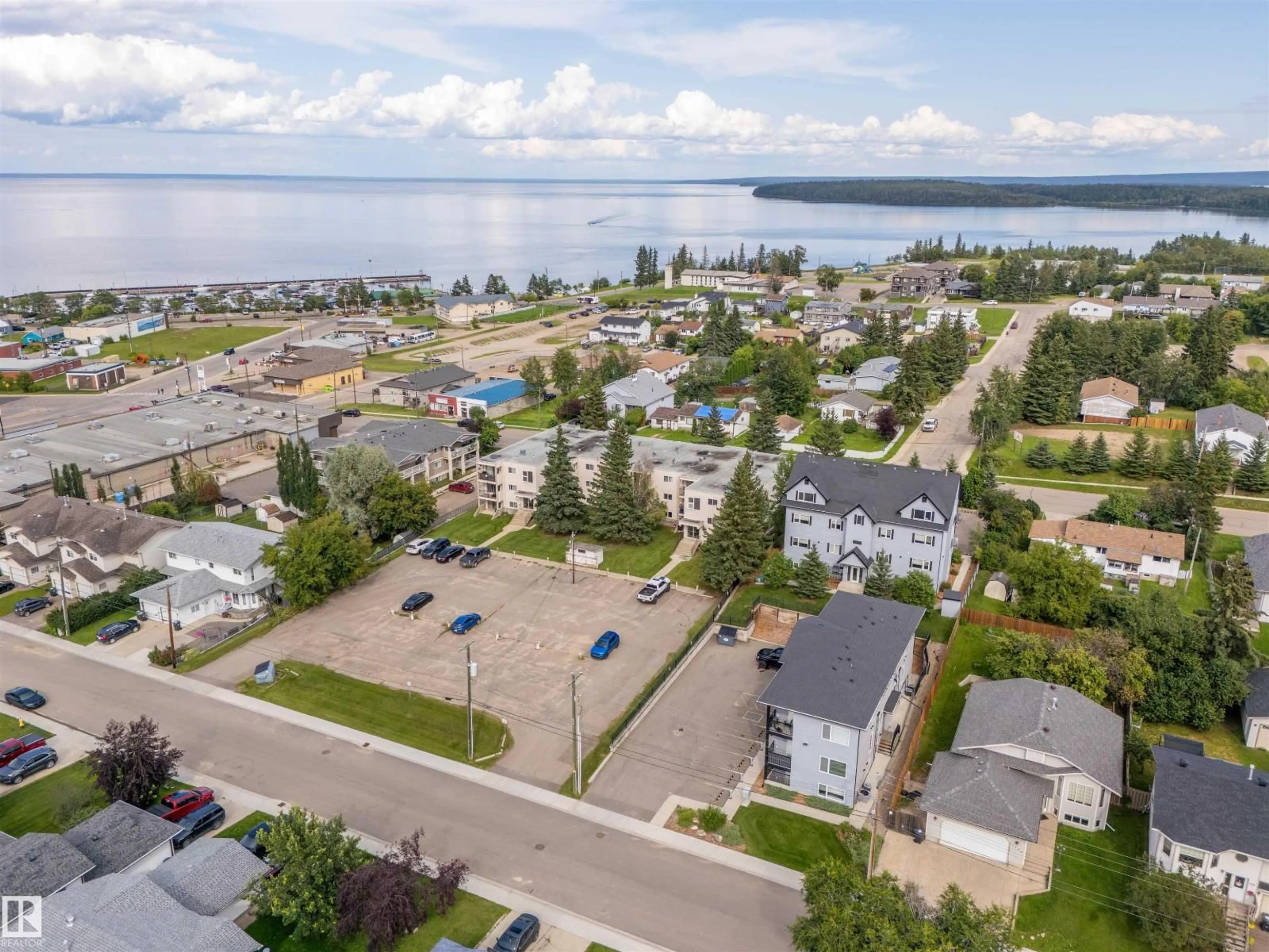 A pic from outside/outdoor area/front of a property/back of a property/a pic from drone, water/lake/river/ocean view for 201 - 911 10 ST, Cold Lake Alberta T9M1J8