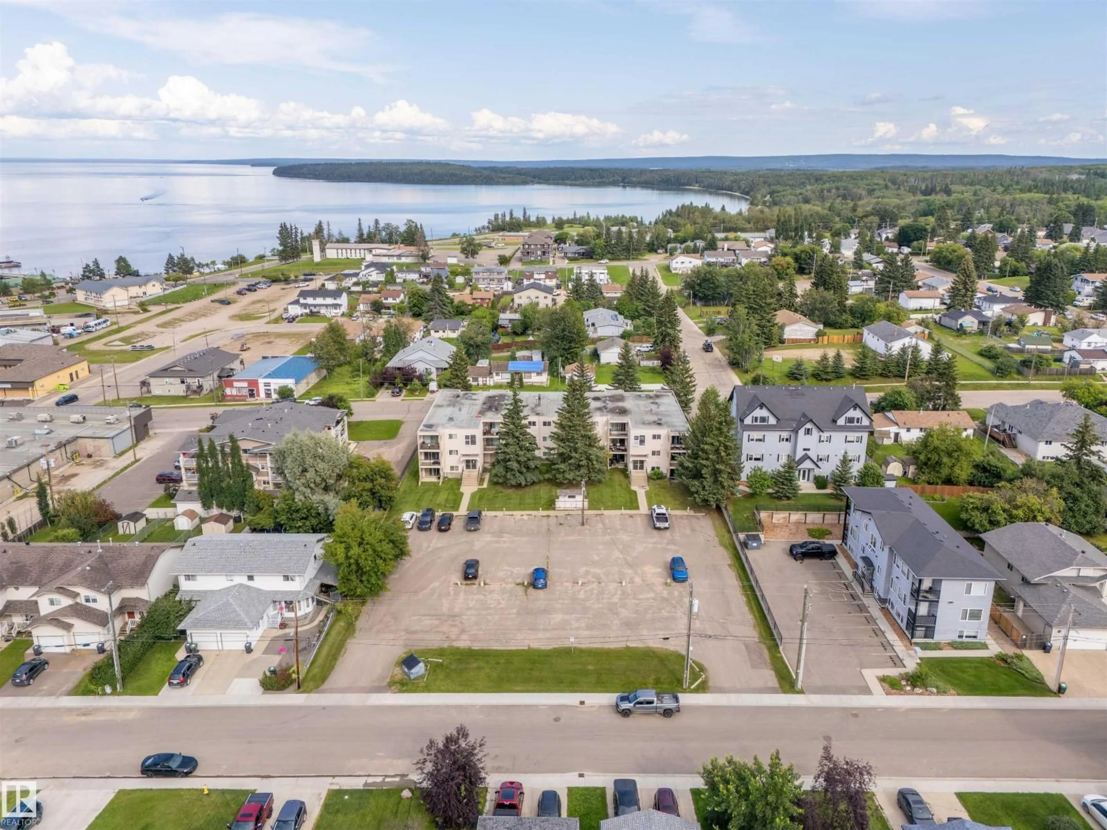 A pic from outside/outdoor area/front of a property/back of a property/a pic from drone, water/lake/river/ocean view for 201 - 911 10 ST, Cold Lake Alberta T9M1J8