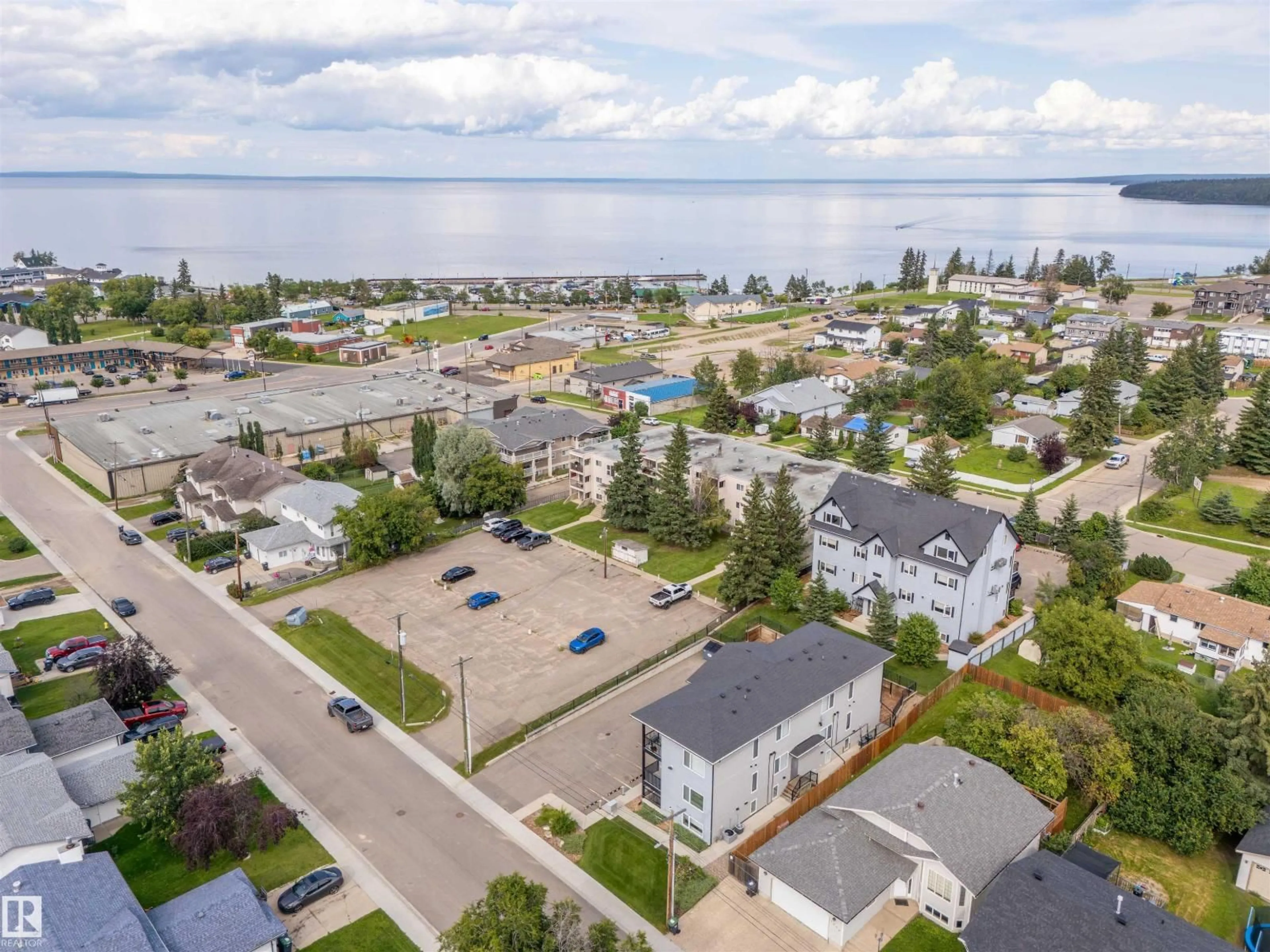 A pic from outside/outdoor area/front of a property/back of a property/a pic from drone, water/lake/river/ocean view for 201 - 911 10 ST, Cold Lake Alberta T9M1J8