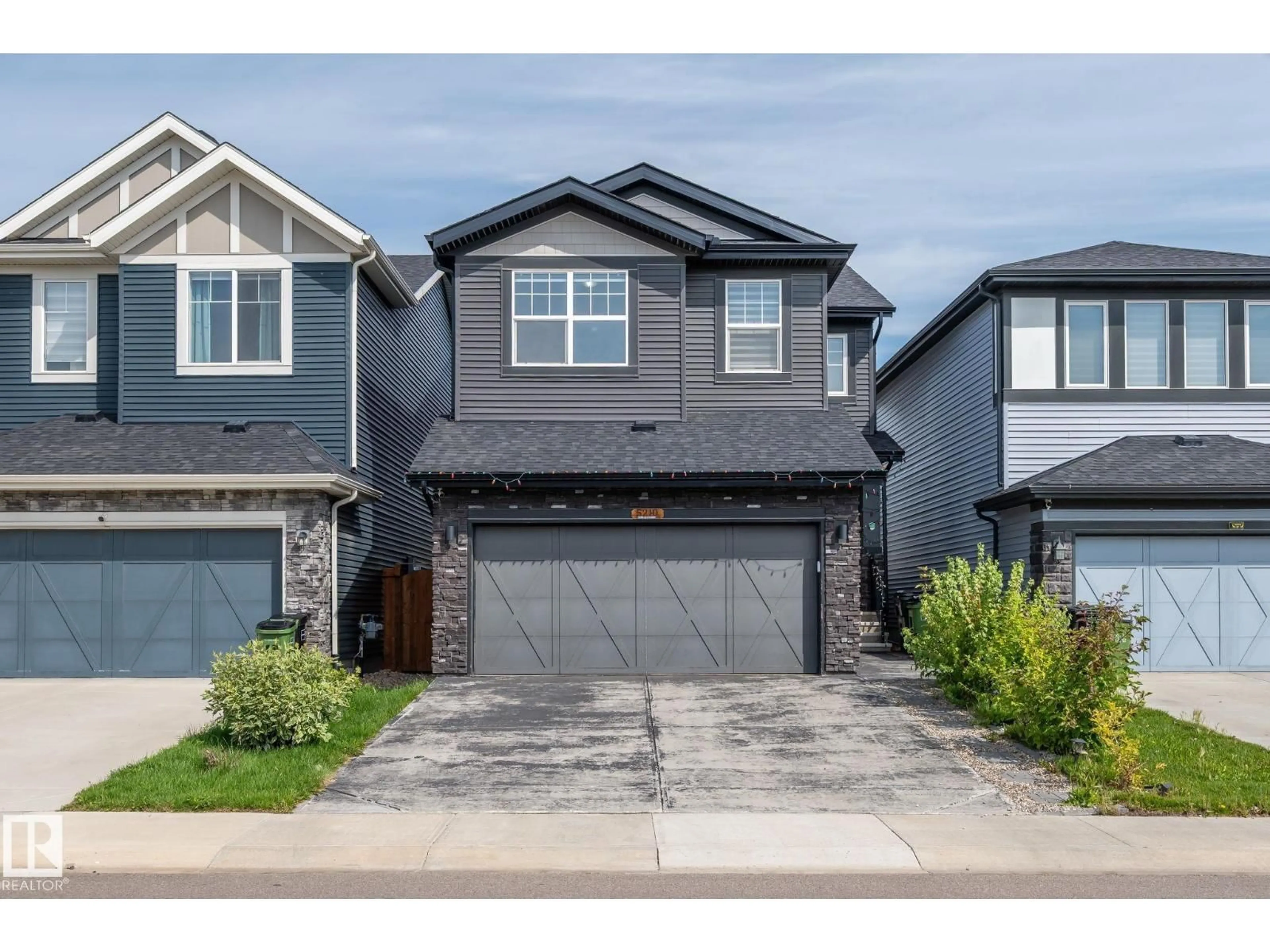 Home with vinyl exterior material, street for SW - 5210 23 AVE, Edmonton Alberta T6X2X4