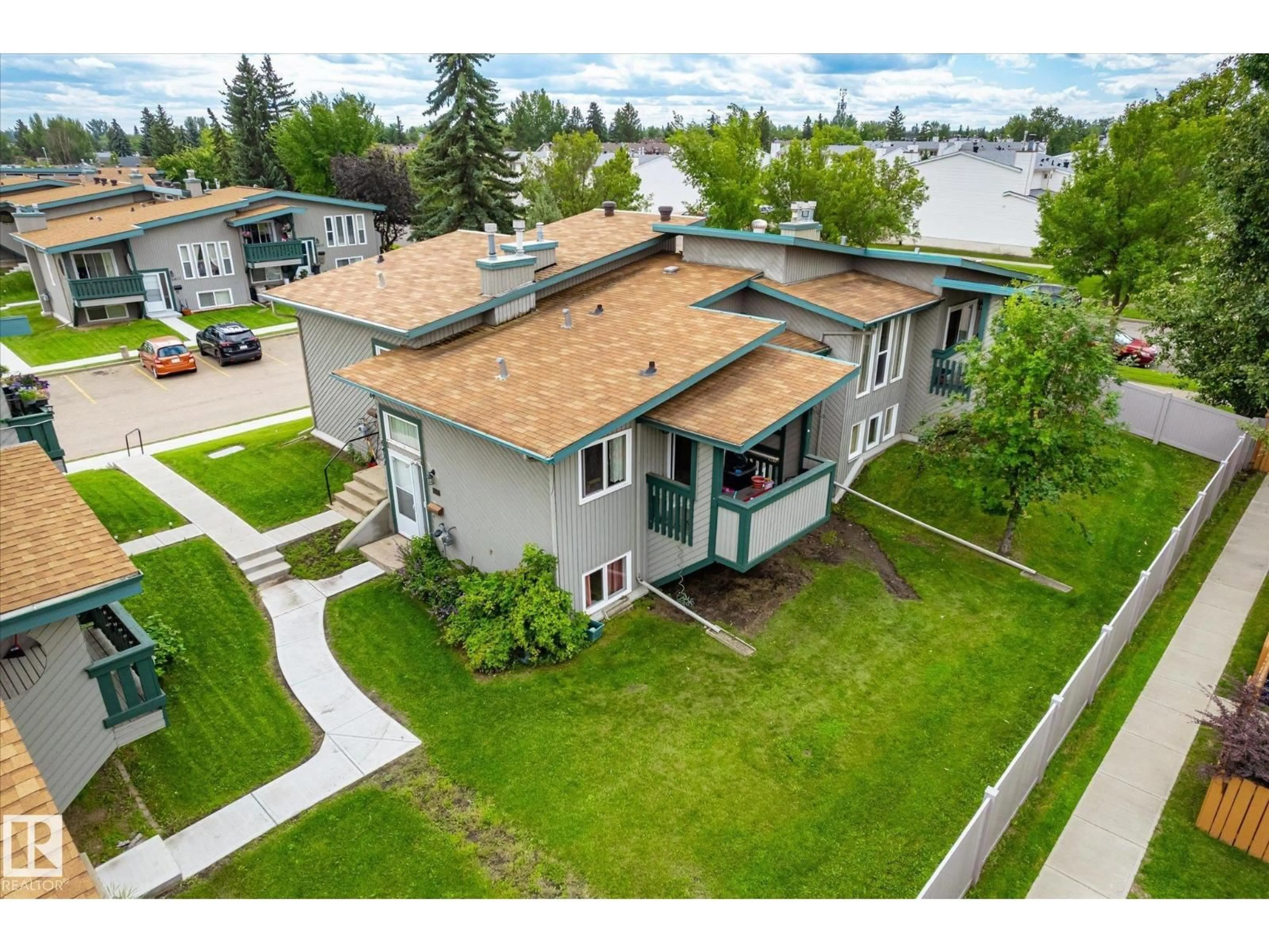 A pic from outside/outdoor area/front of a property/back of a property/a pic from drone, water/lake/river/ocean view for 6471 180 ST NW, Edmonton Alberta T5T2P3