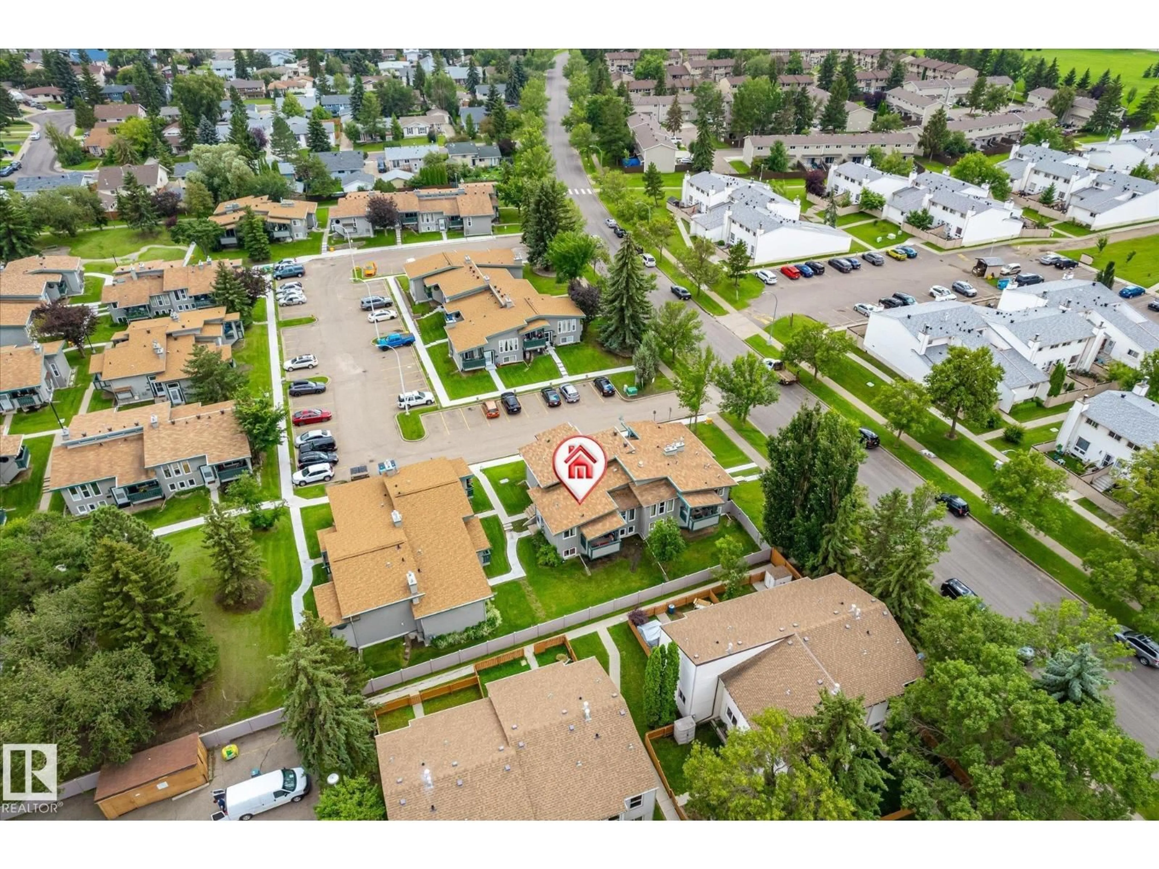 A pic from outside/outdoor area/front of a property/back of a property/a pic from drone, street for 6471 180 ST NW, Edmonton Alberta T5T2P3