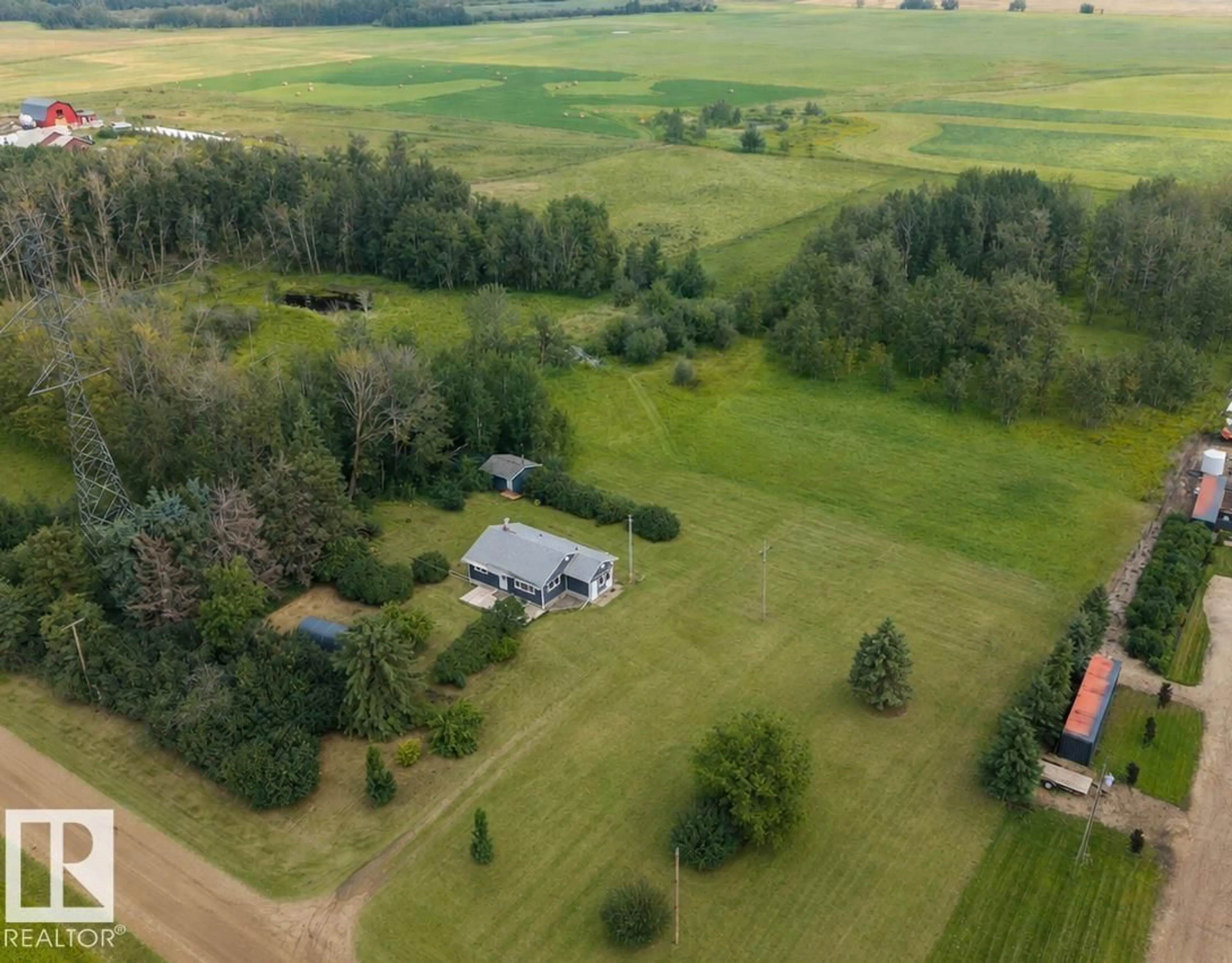A pic from outside/outdoor area/front of a property/back of a property/a pic from drone, unknown for 472013 RGE ROAD 245, Rural Wetaskiwin County Alberta T0C1Z0