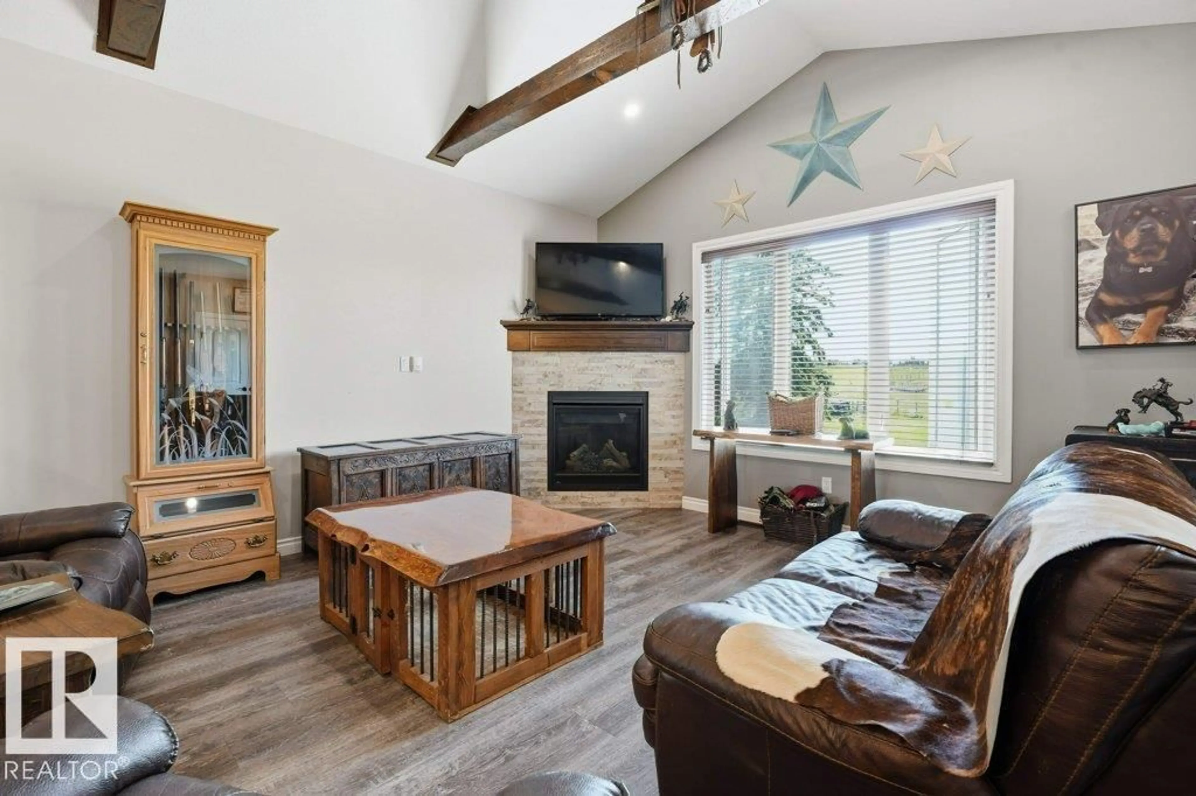 Living room with furniture, wood/laminate floor for 55413 RGE ROAD 53A, Rural Lac Ste. Anne County Alberta T0E0J0
