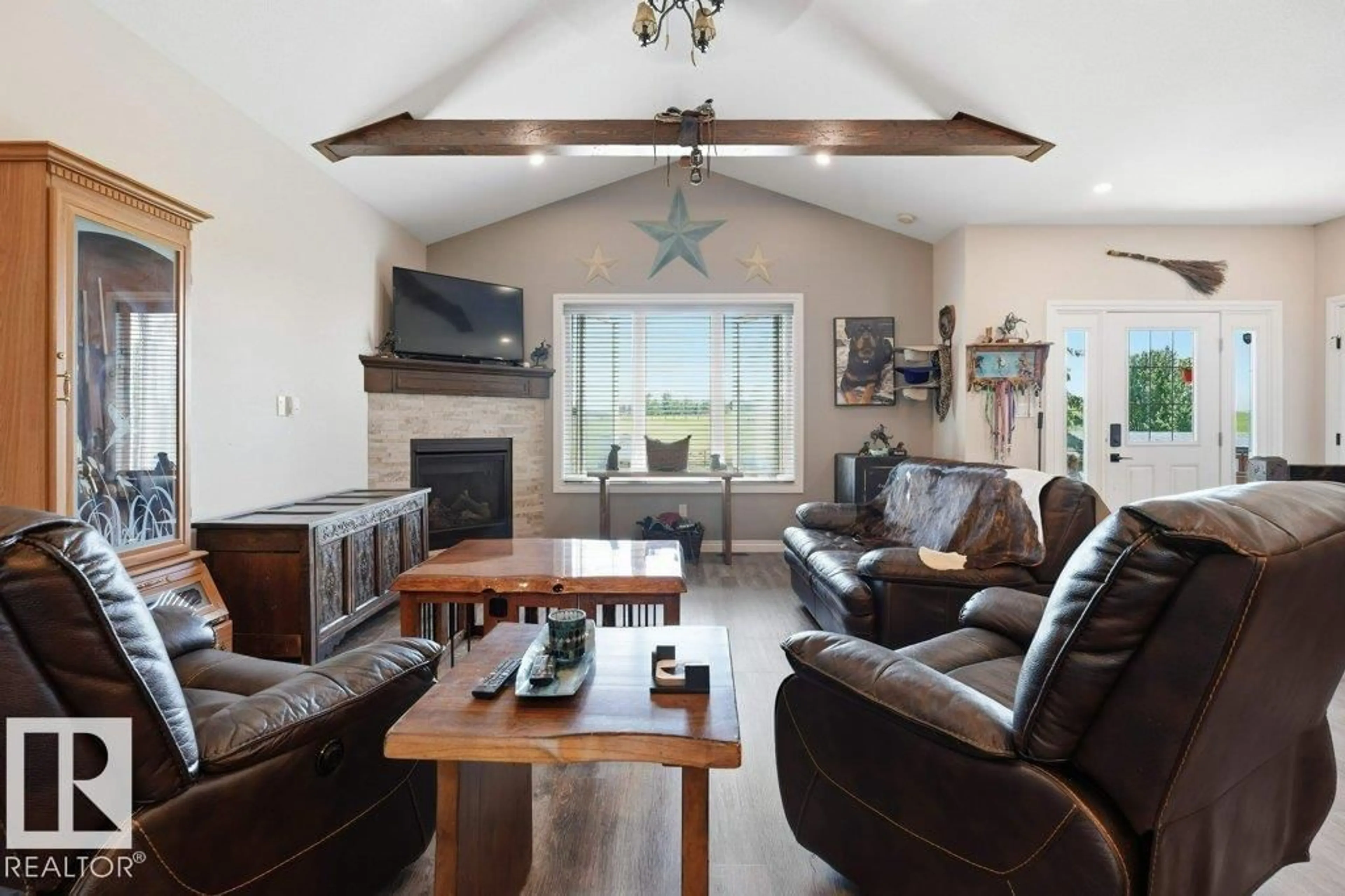 Living room with furniture, wood/laminate floor for 55413 RGE ROAD 53A, Rural Lac Ste. Anne County Alberta T0E0J0