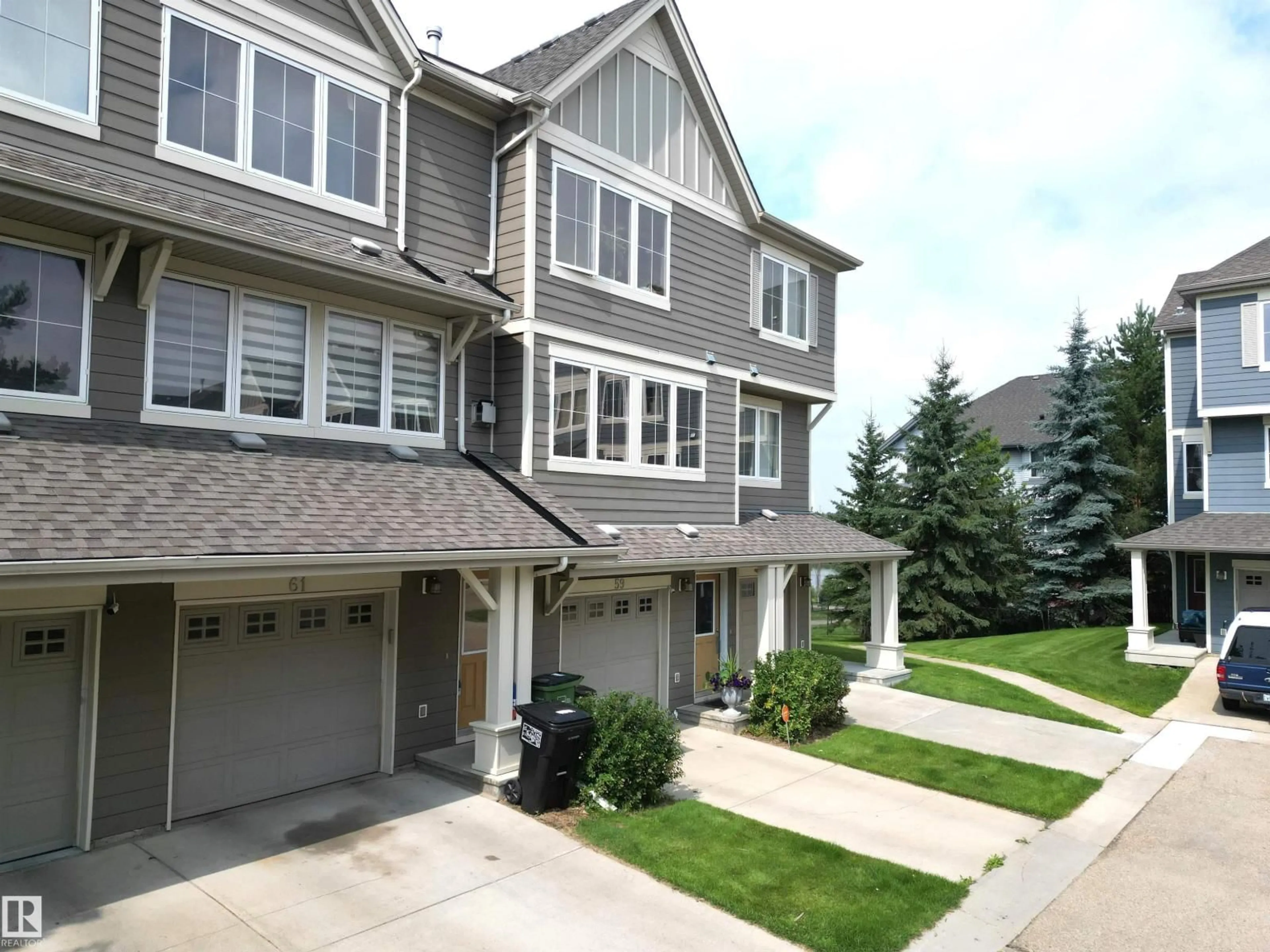 Home with vinyl exterior material, street for #61 - 603 WATT BV, Edmonton Alberta T6X0P3
