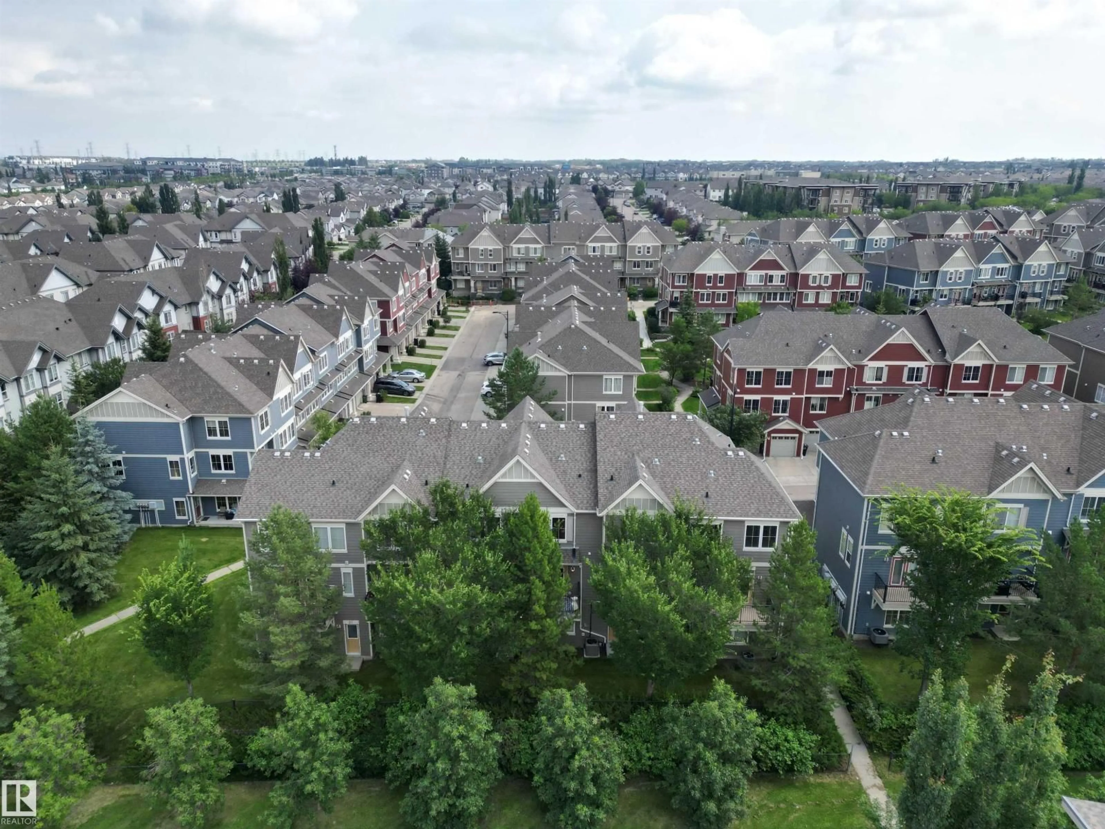A pic from outside/outdoor area/front of a property/back of a property/a pic from drone, unknown for #61 - 603 WATT BV, Edmonton Alberta T6X0P3