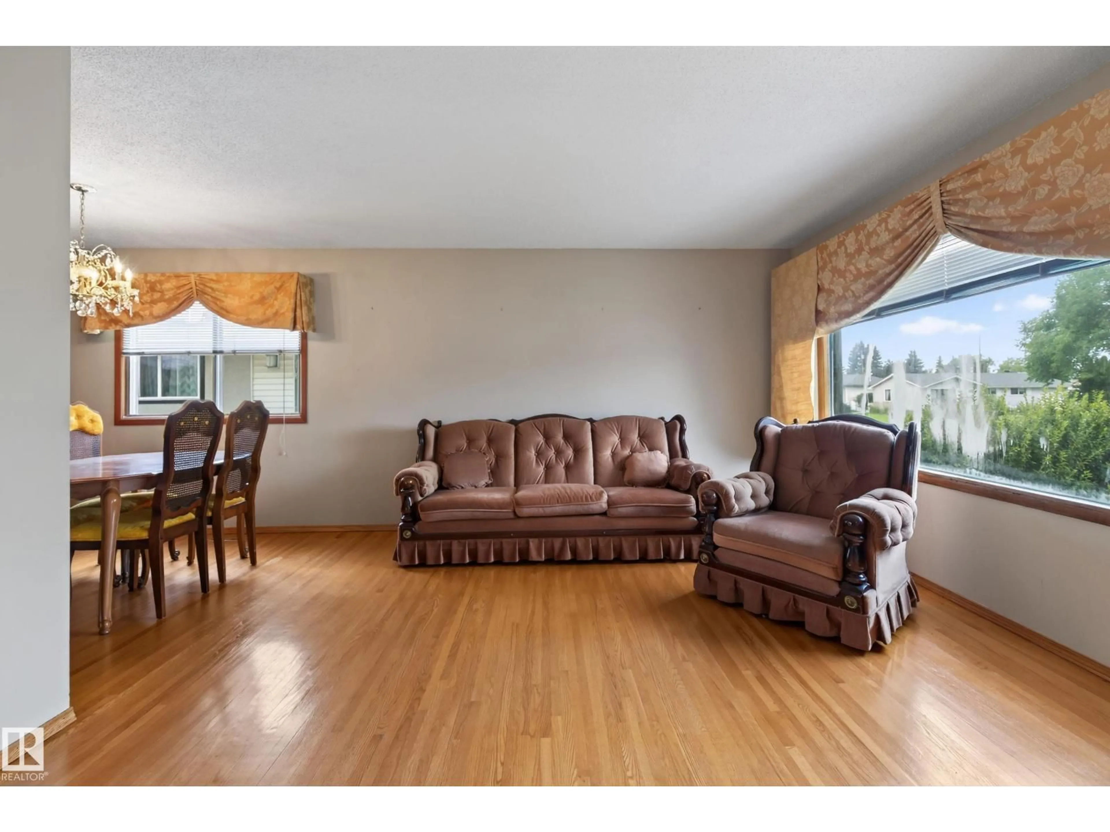Living room with furniture, unknown for 8411 136 AV, Edmonton Alberta T5E1T9