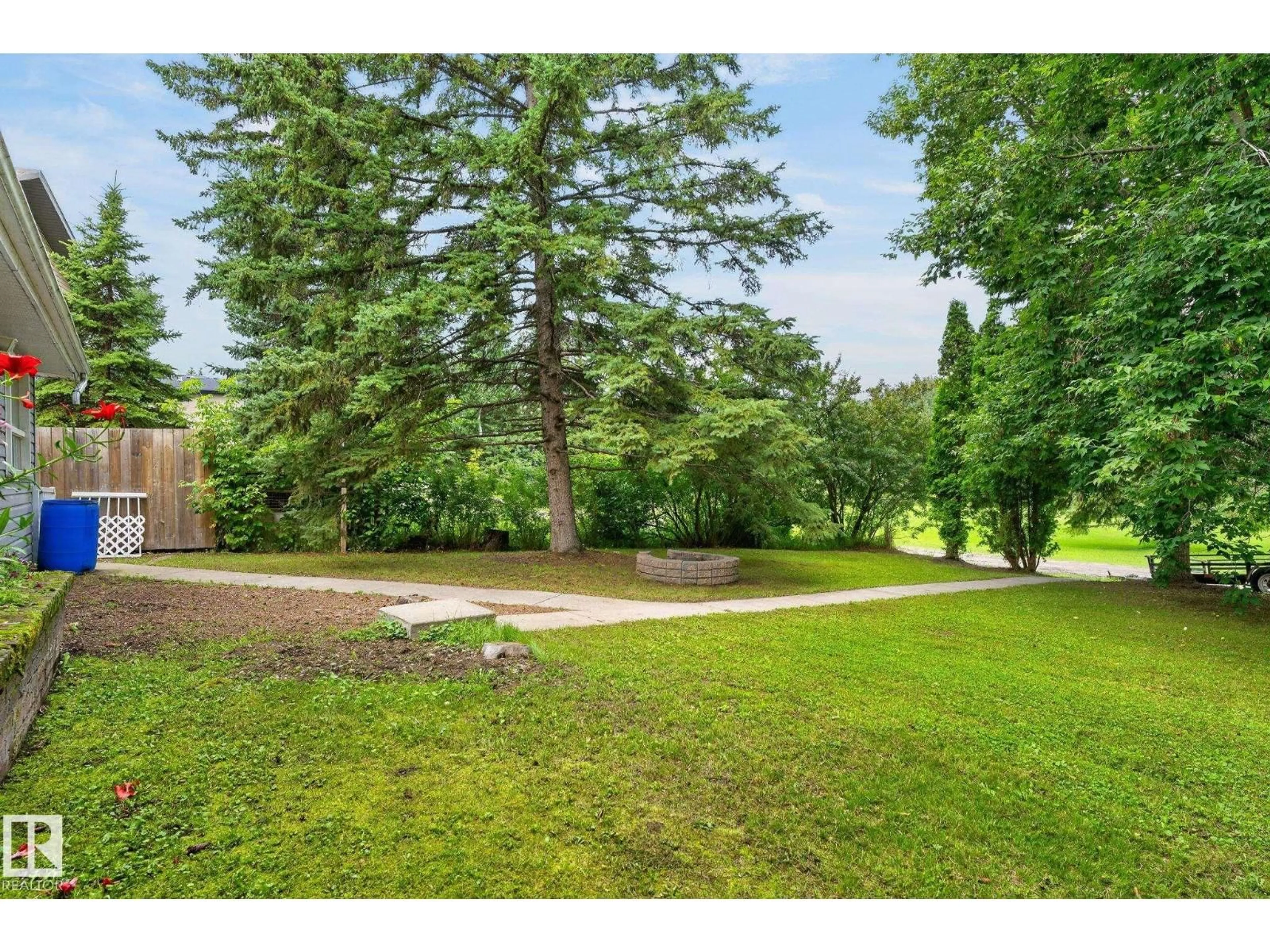 A pic from outside/outdoor area/front of a property/back of a property/a pic from drone, forest/trees view for 351 SMITH CR, Rural Parkland County Alberta T7Z2T9