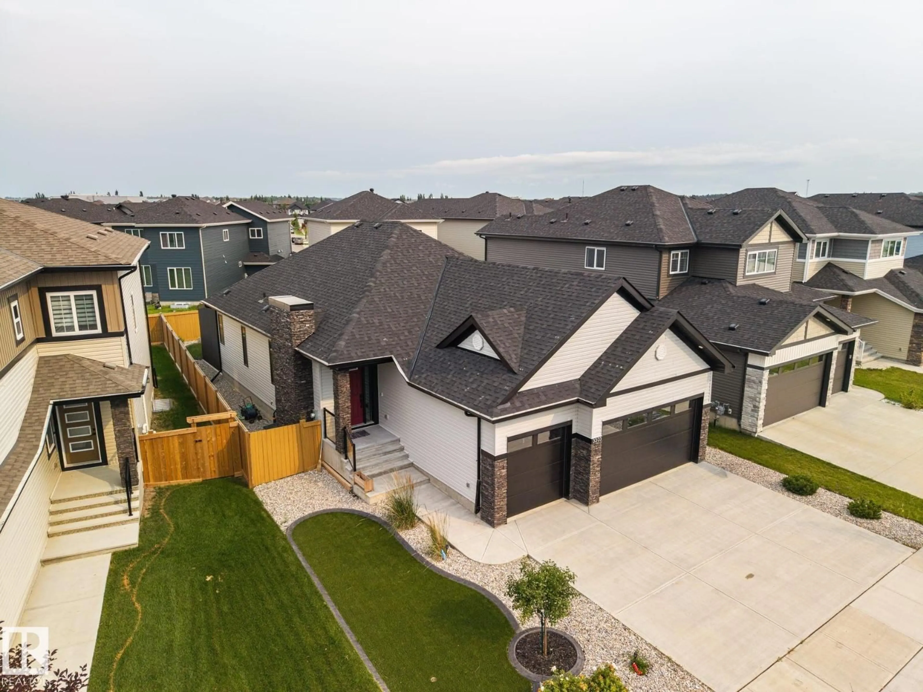 A pic from outside/outdoor area/front of a property/back of a property/a pic from drone, street for 3303 SOLEIL BV, Beaumont Alberta T4X2X8