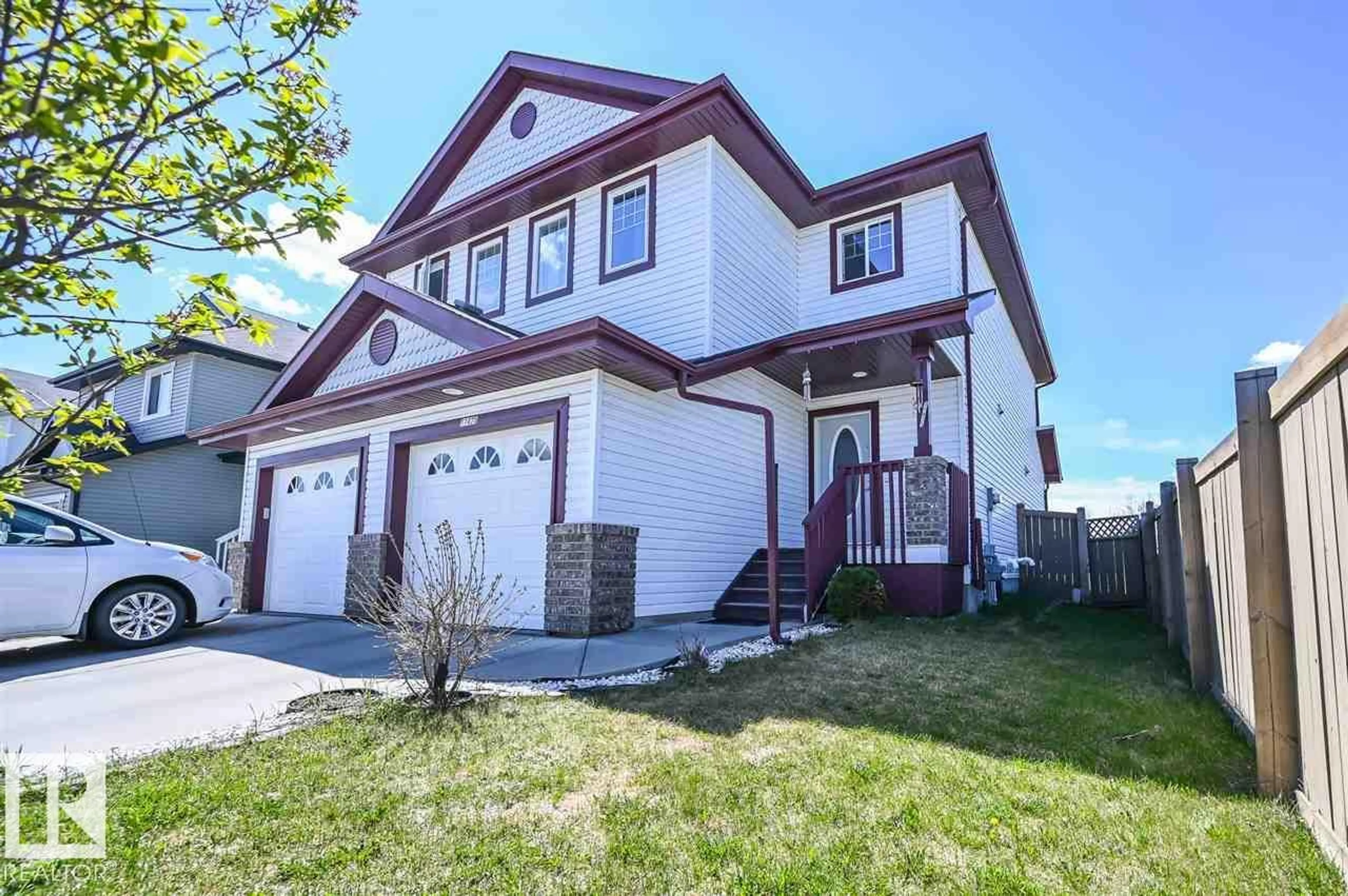Home with vinyl exterior material, street for SW - 11425 14 AV, Edmonton Alberta T6W0N4