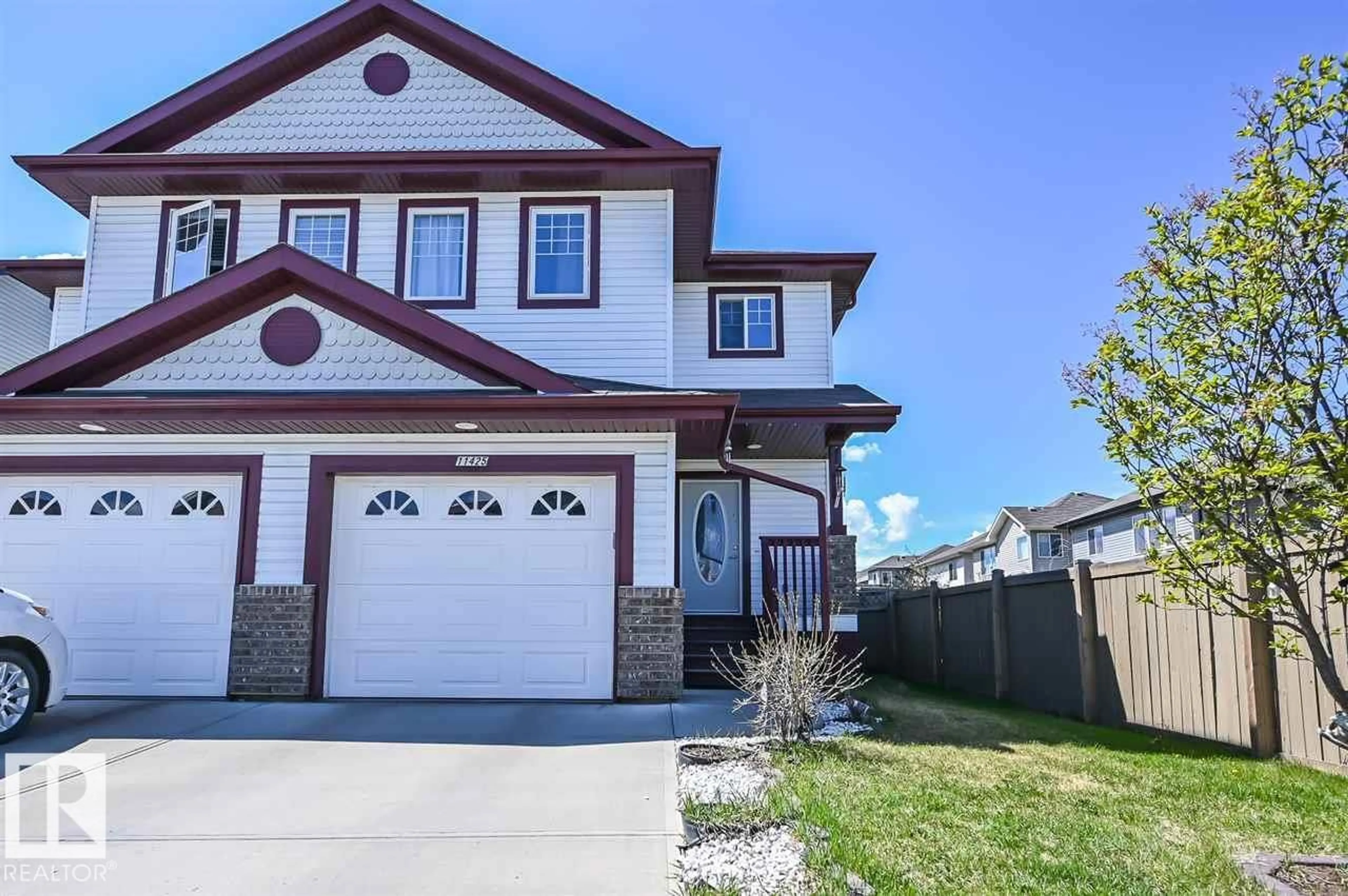 Home with vinyl exterior material, street for SW - 11425 14 AV, Edmonton Alberta T6W0N4