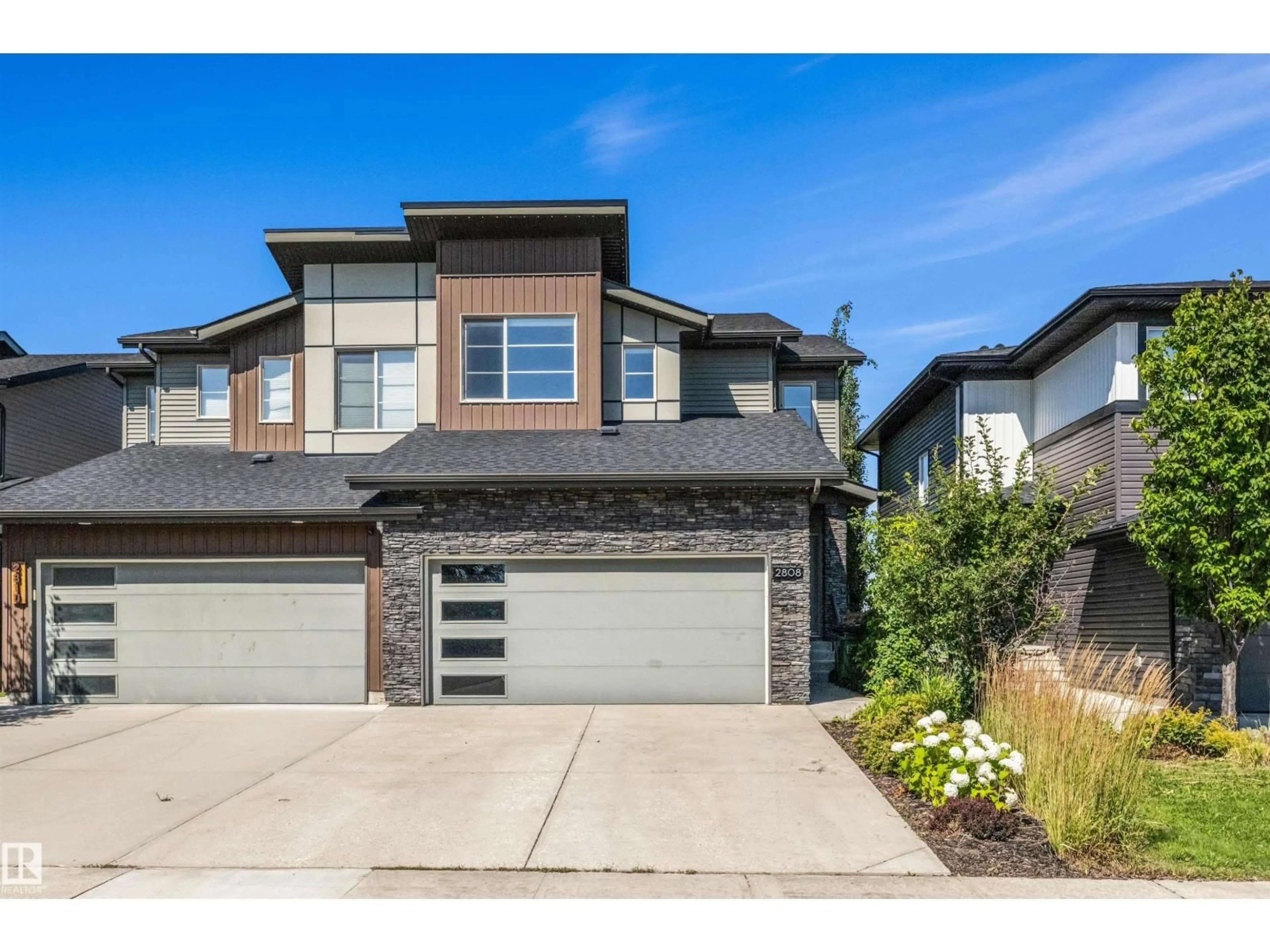 Home with brick exterior material, street for 2808 KOSHAL CR, Edmonton Alberta T6W3J7