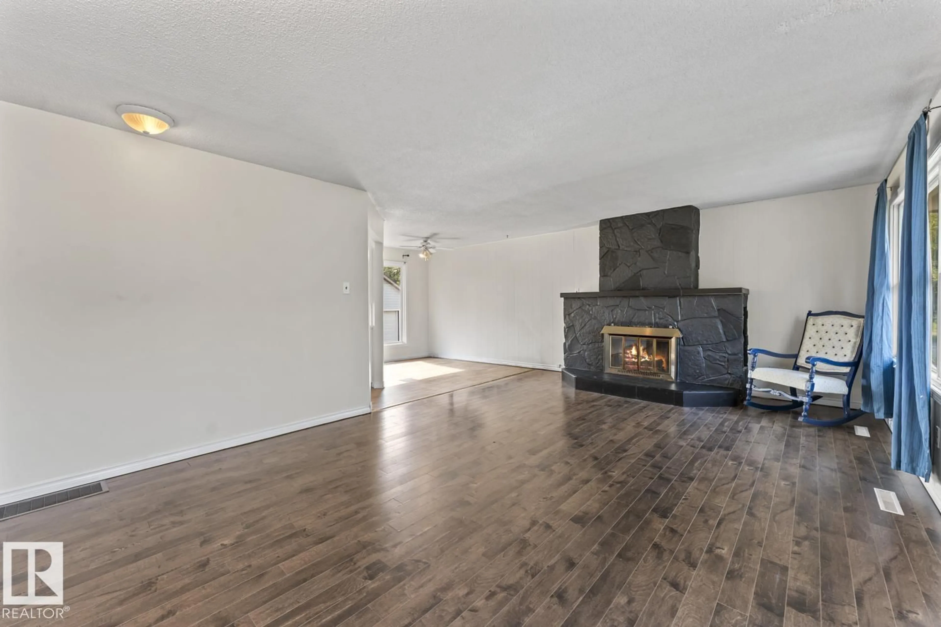 Living room with furniture, wood/laminate floor for 5105 58 ST, Cold Lake Alberta T9M1S3
