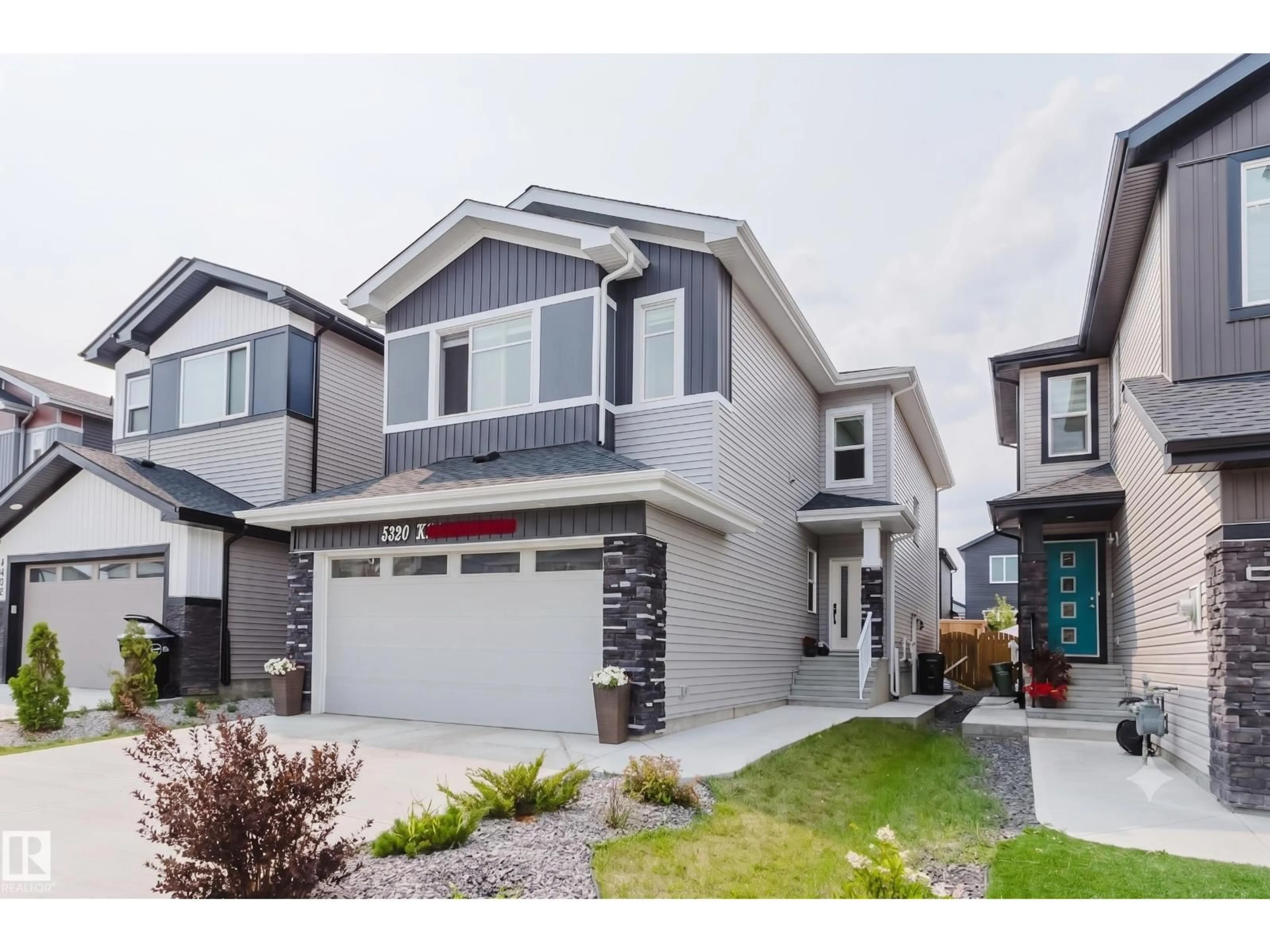 Home with vinyl exterior material, street for 5320 KIMBALL PL, Edmonton Alberta T6W5E6