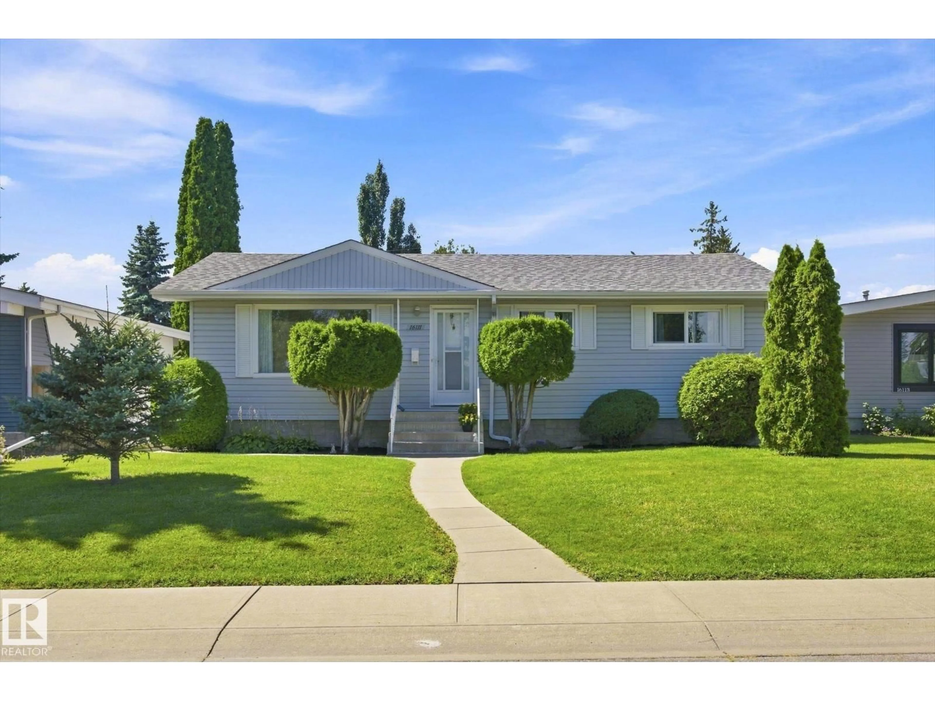 Home with vinyl exterior material, street for 16111 88A AV, Edmonton Alberta T5R4N5