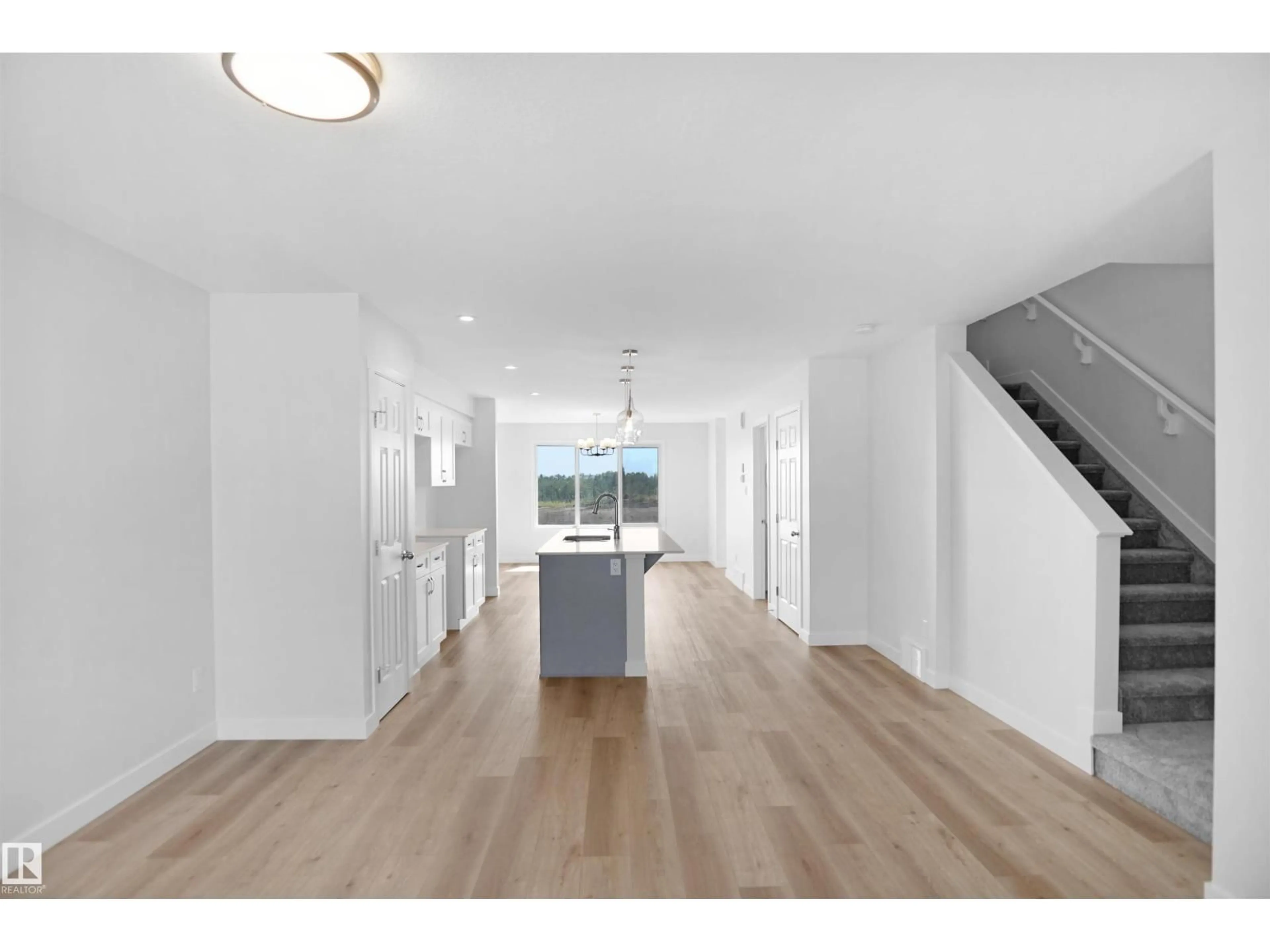 Open concept kitchen, unknown for 106 JUNIPER WD, Fort Saskatchewan Alberta T8L3S4
