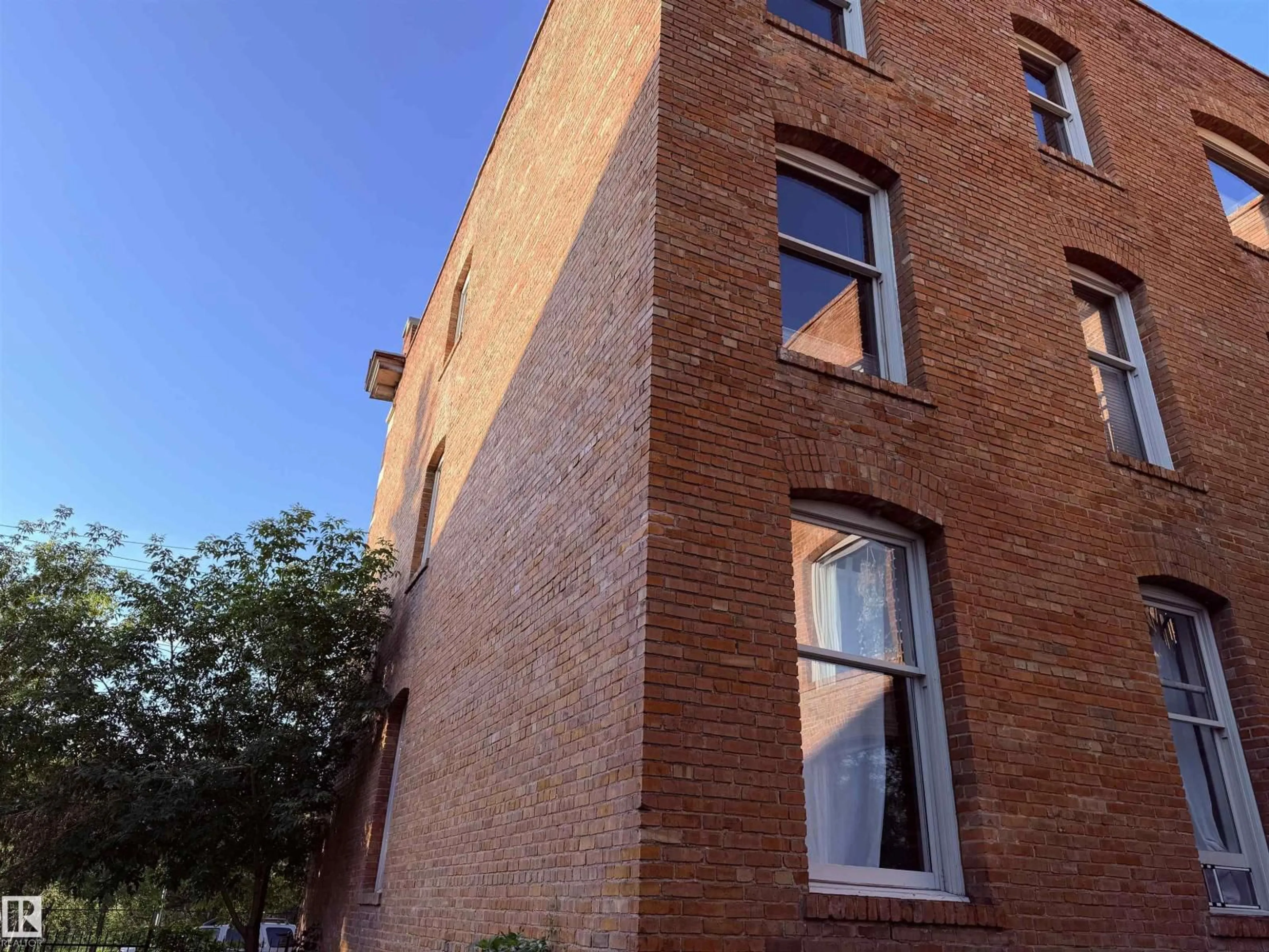 Home with brick exterior material, building for #203 - 10141 95 ST, Edmonton Alberta T5H2A8
