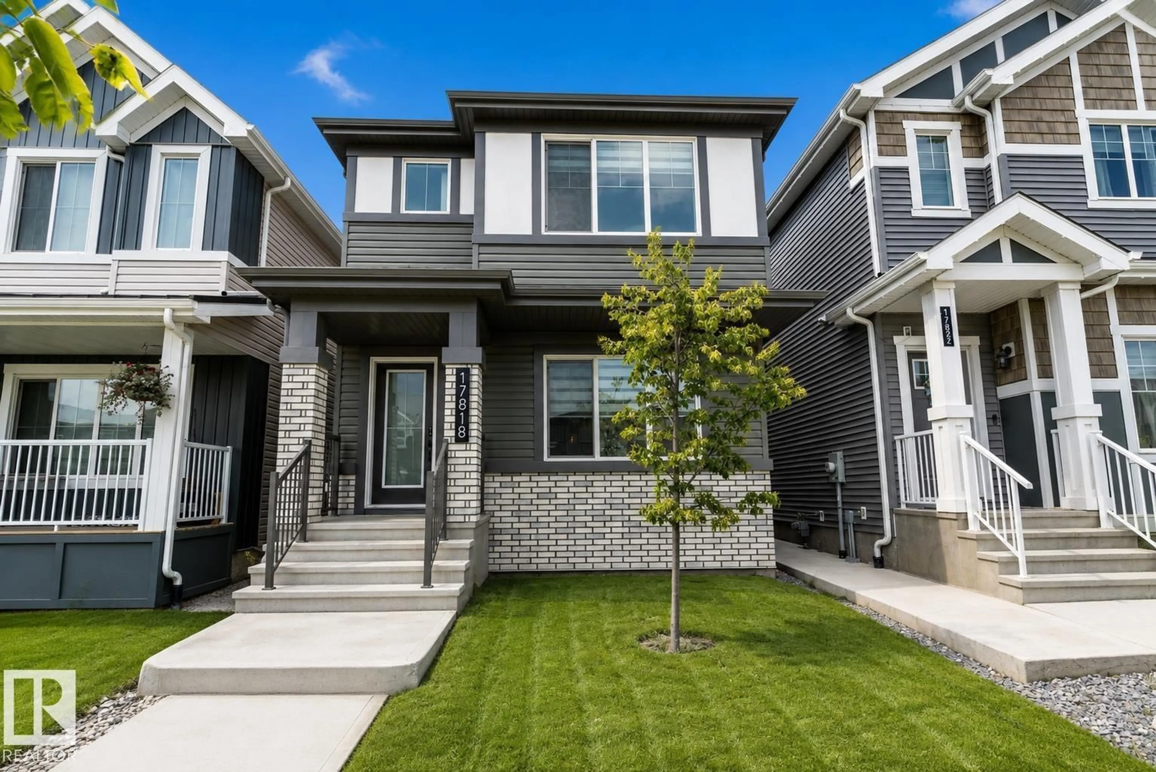 Home with vinyl exterior material, street for 17818 70A ST NW, Edmonton Alberta T5Z0V3