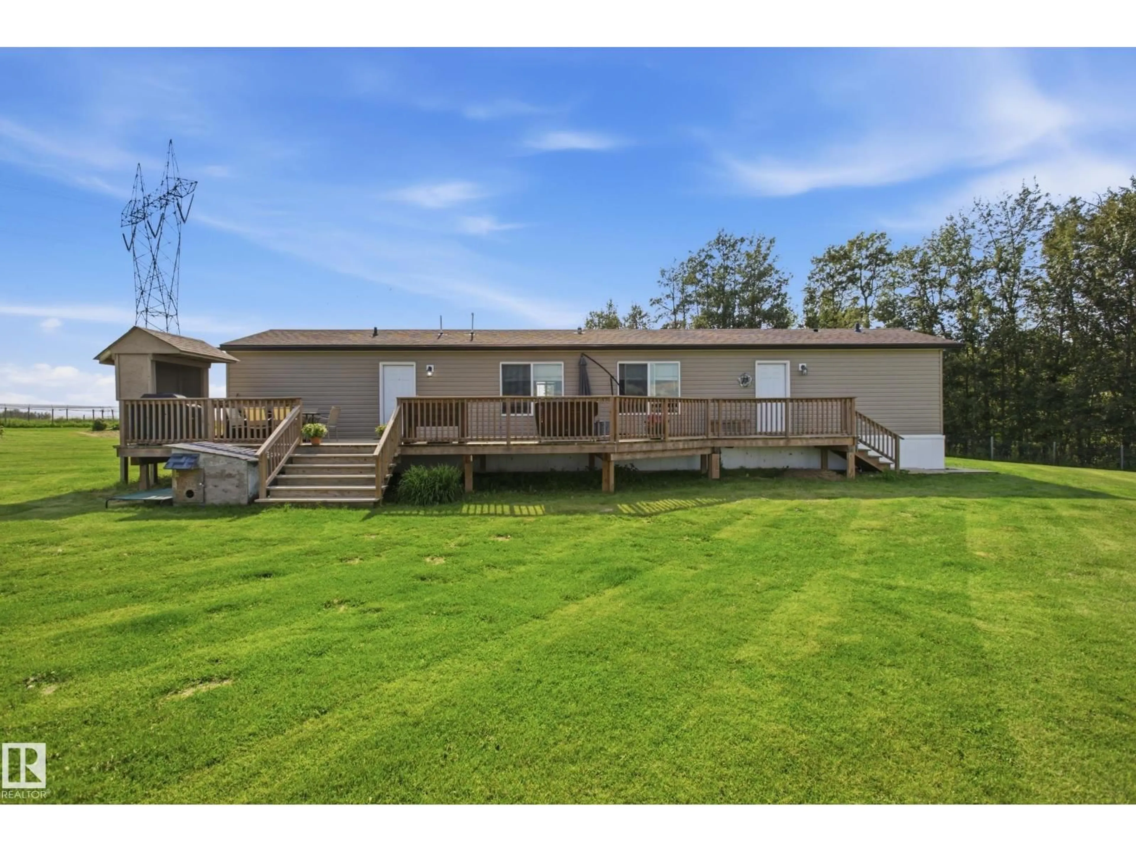 A pic from outside/outdoor area/front of a property/back of a property/a pic from drone, water/lake/river/ocean view for 51017 RGE RD 14, Rural Parkland County Alberta T7Y2C8
