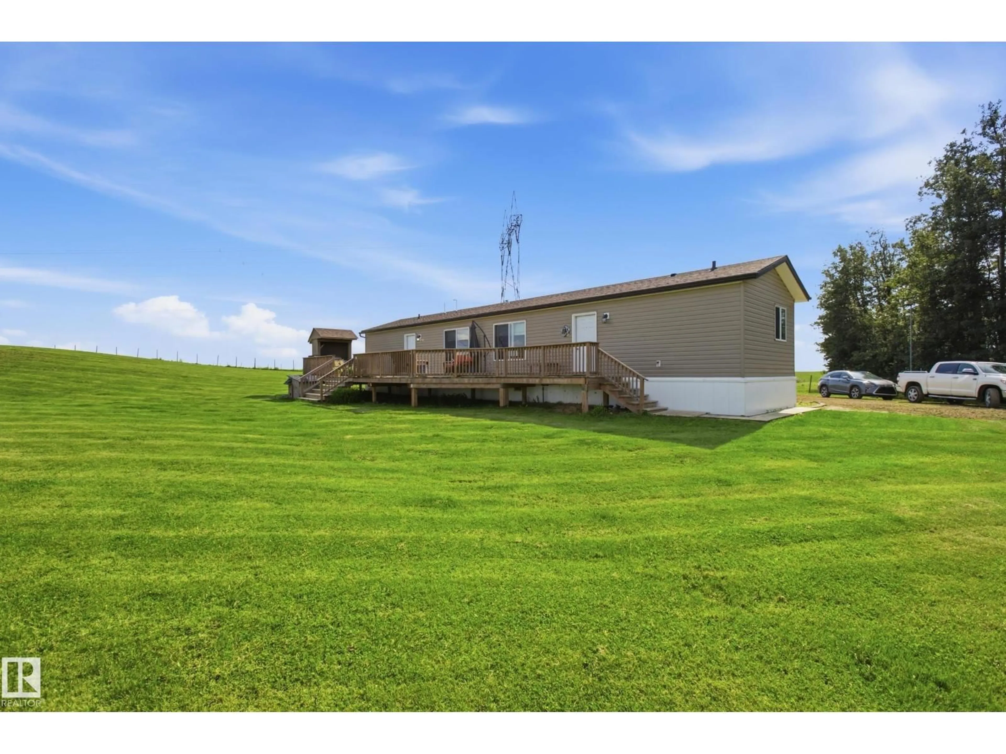 A pic from outside/outdoor area/front of a property/back of a property/a pic from drone, water/lake/river/ocean view for 51017 RGE RD 14, Rural Parkland County Alberta T7Y2C8