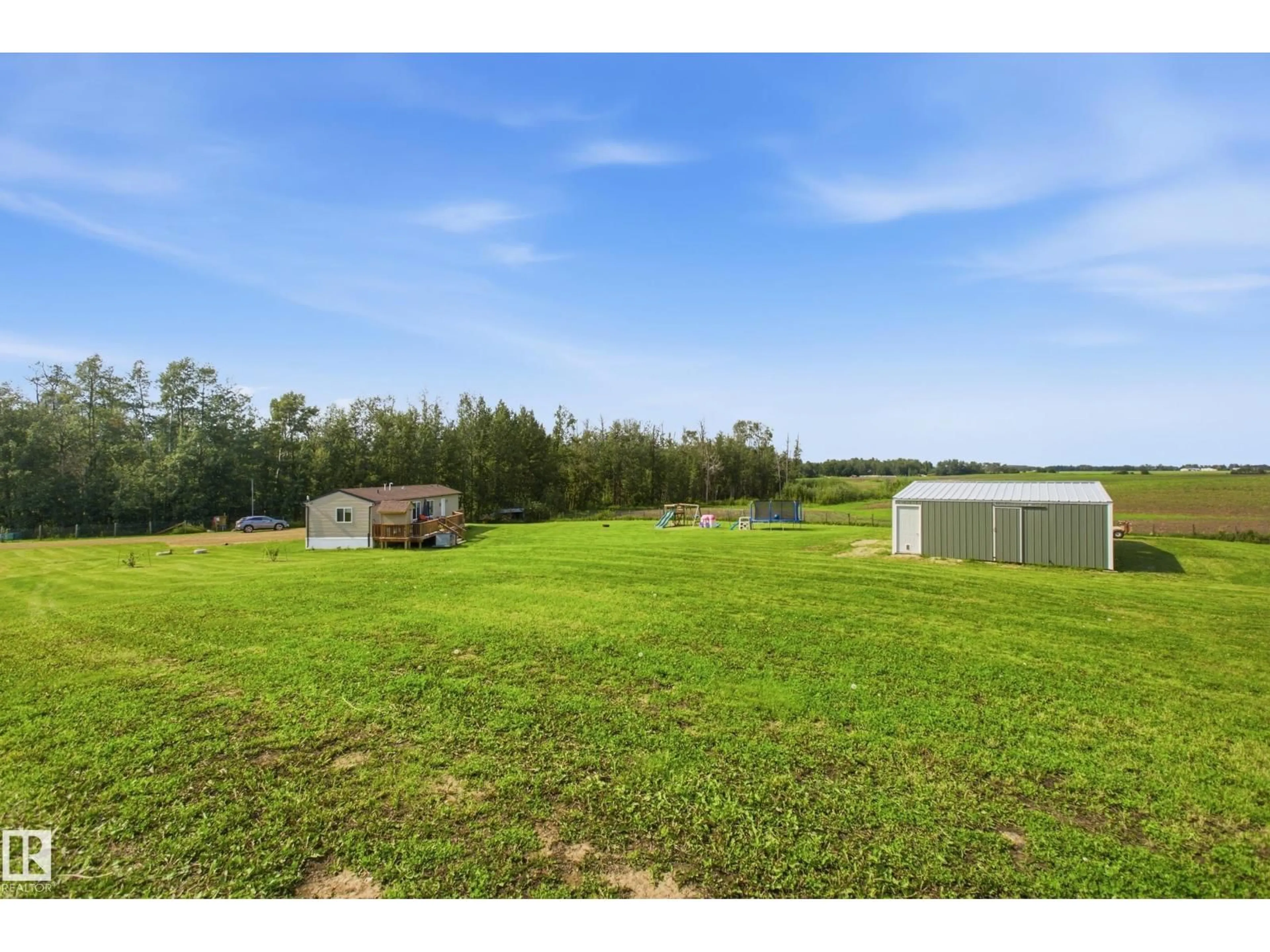 A pic from outside/outdoor area/front of a property/back of a property/a pic from drone, water/lake/river/ocean view for 51017 RGE RD 14, Rural Parkland County Alberta T7Y2C8