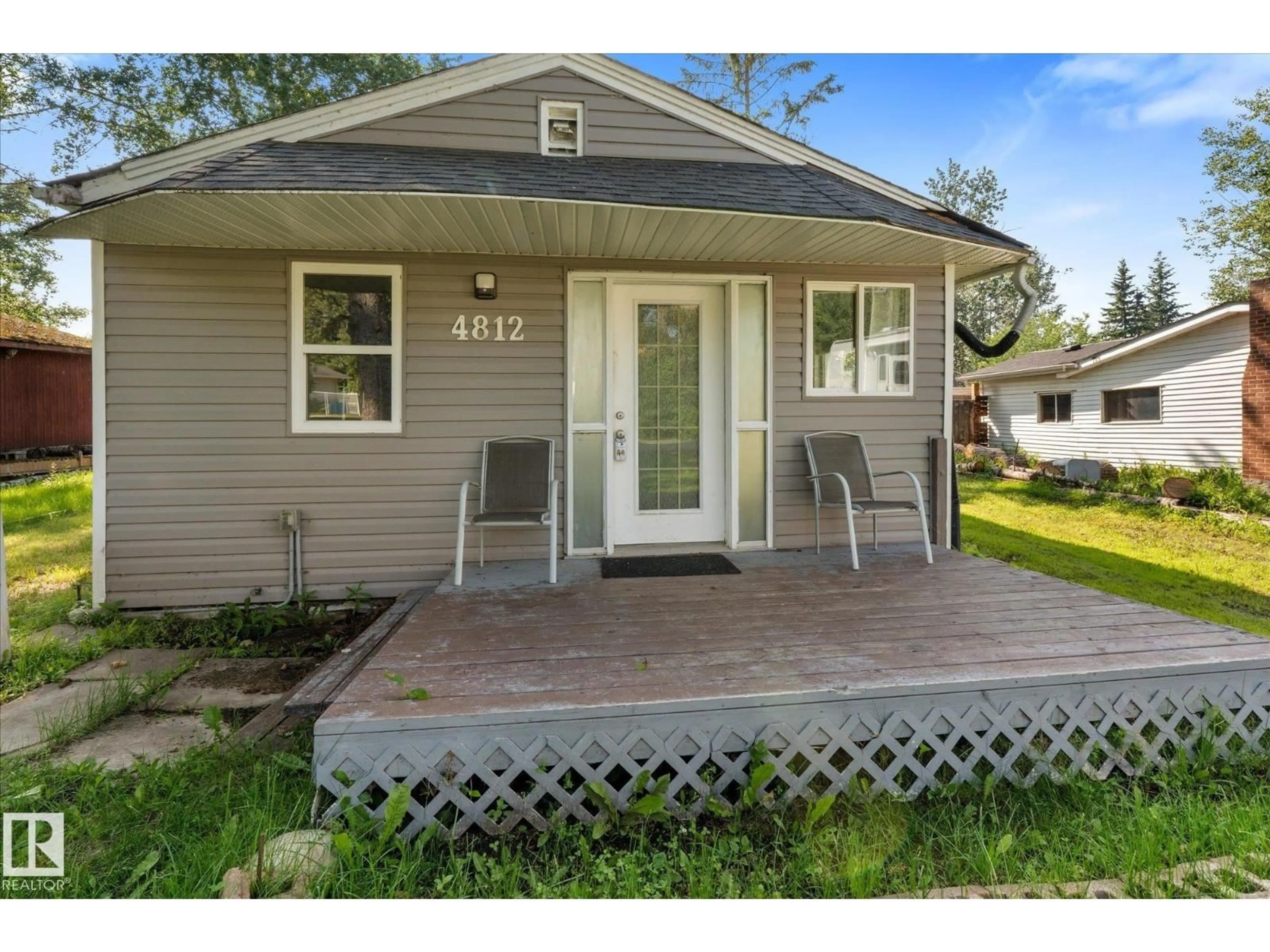 Home with vinyl exterior material, street for 4812 59 ST, Rural Lac Ste. Anne County Alberta T0E0A0